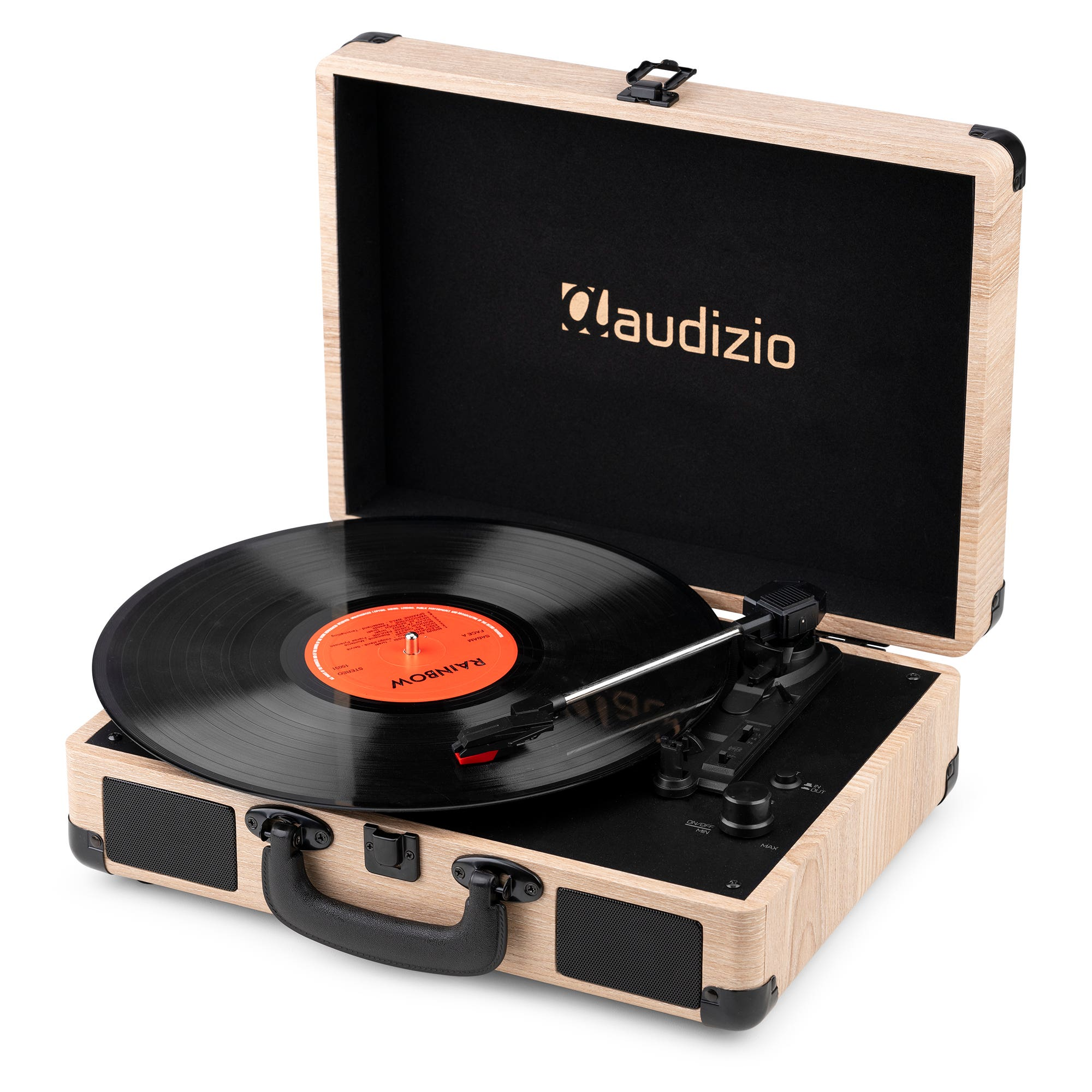 Un tocadiscos en un estuche de madera abierto, reproduciendo un disco de vinilo. Disco negro, etiqueta naranja.