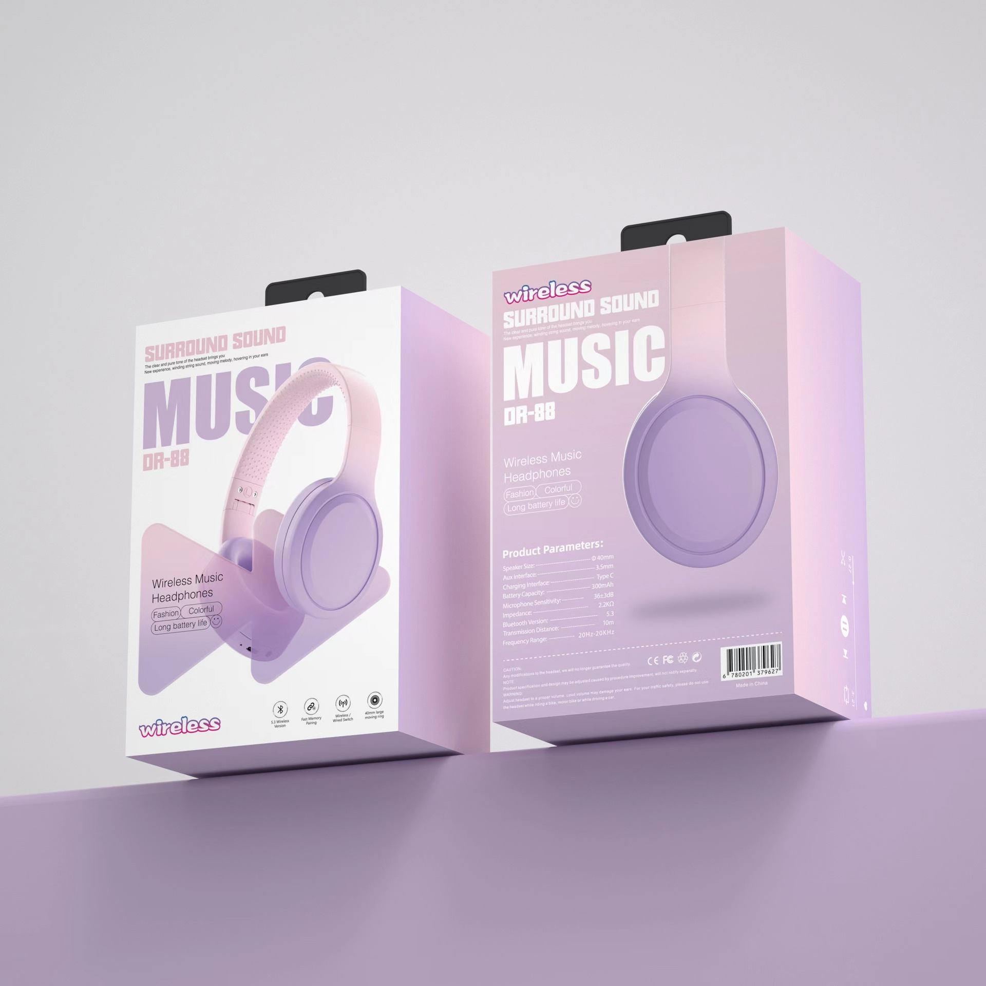 Eine Schachtel mit kabellosen Kopfhörern. Die Schachtel ist rosa und die Kopfhörer sind lila. Der Text MUSIK ist sichtbar.