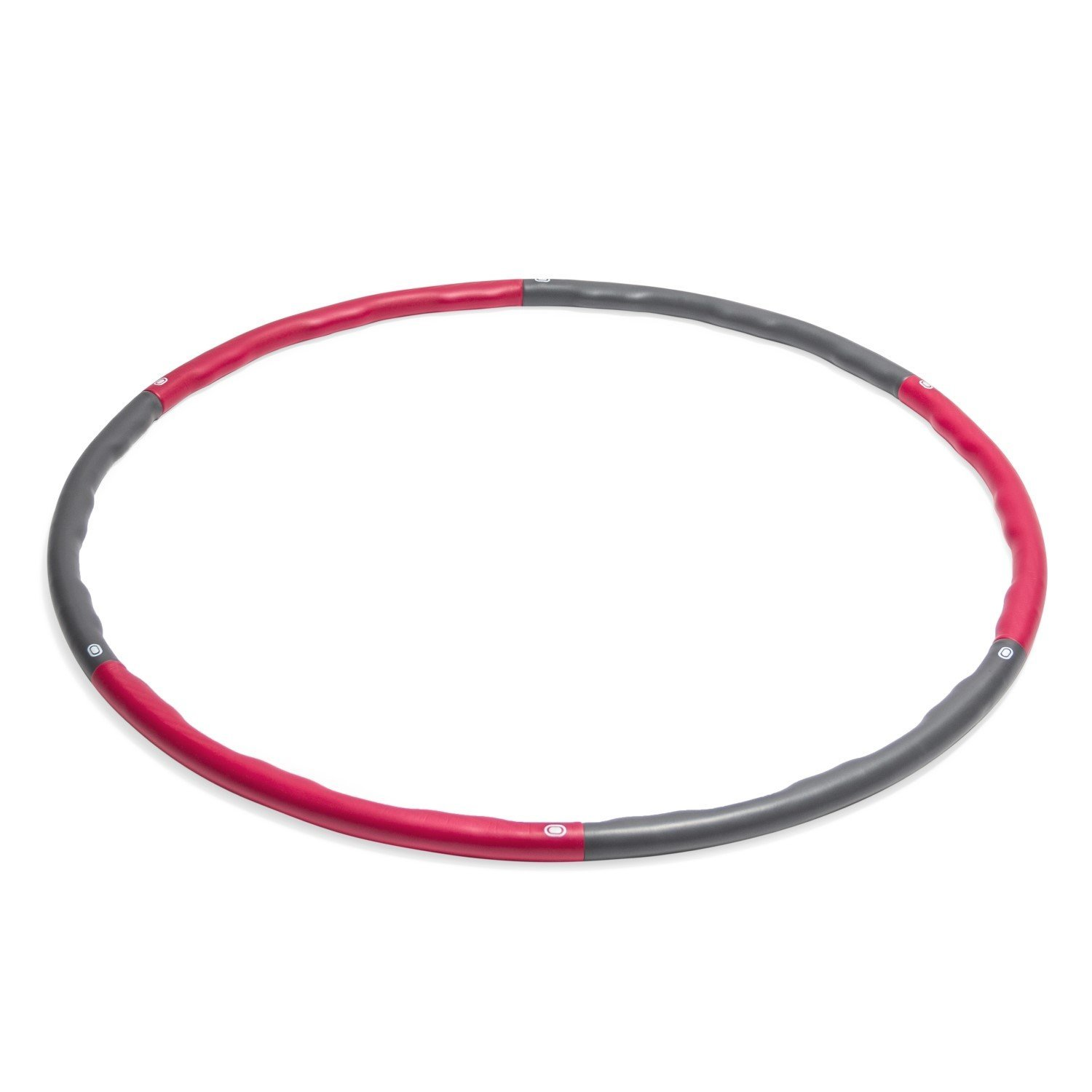 Ein Hula-Hoop-Reifen, rot und grau, liegt auf einer weißen Oberfläche. Der Reifen ist kreisförmig mit roten und grauen Abschnitten.