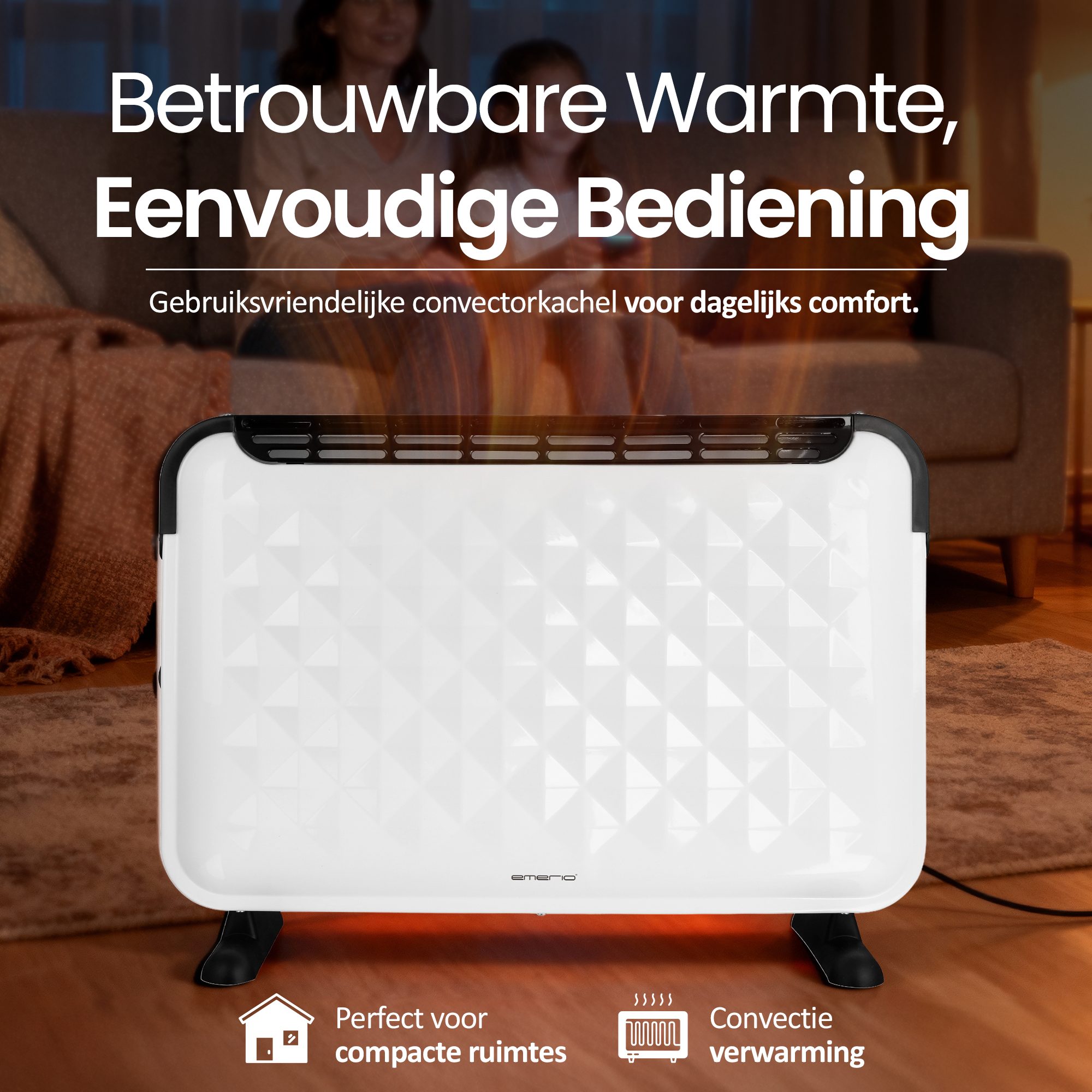 Een witte elektrische kachel staat op de vloer met een vrouw op de achtergrond bij een bank.