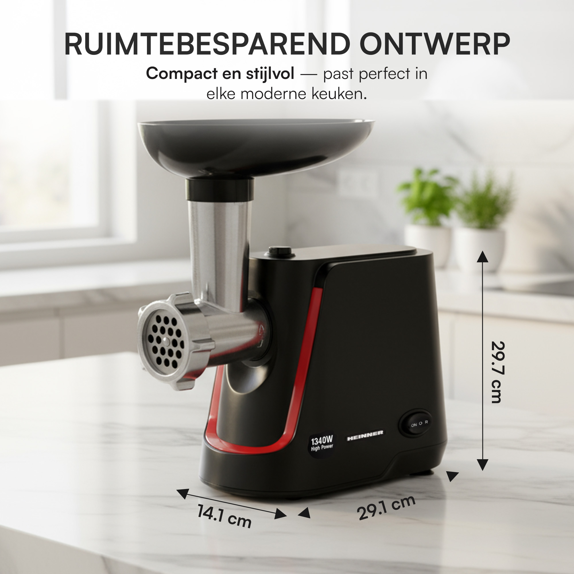 A black and silver meat grinder with red accents on a countertop. Dimensions are displayed.