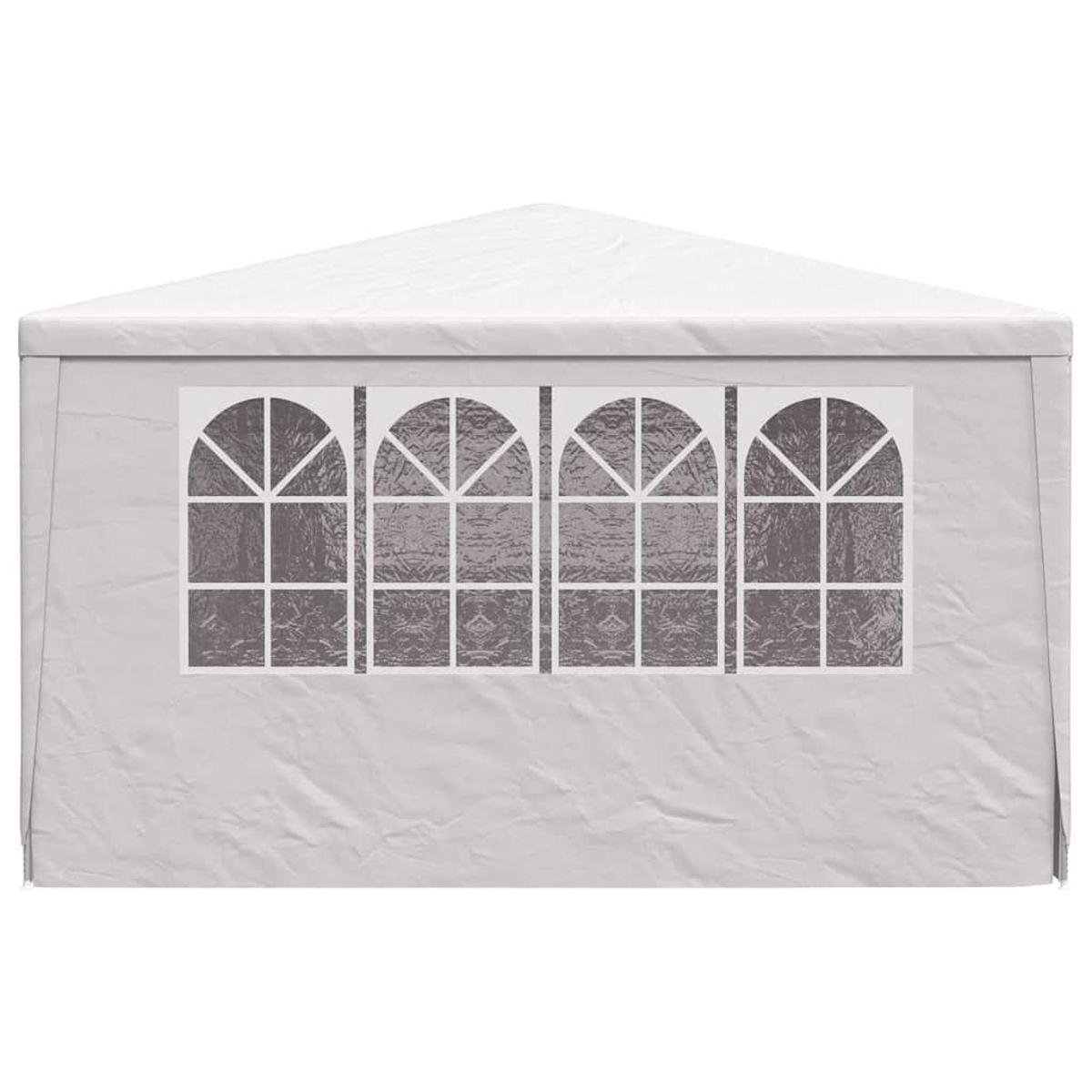 Una carpa blanca con techo a dos aguas y cuatro ventanas arqueadas. Las ventanas están divididas en cuadrados y triángulos más pequeños.