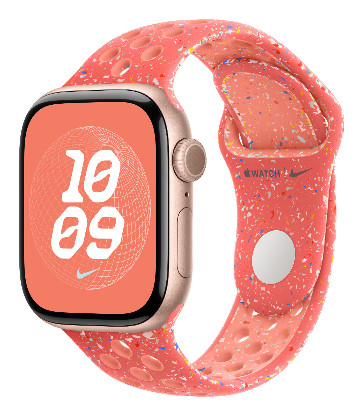 Apple Watch z koralowym paskiem. Ekran pokazuje 10:09. Pasek ma nakrapiany wzór i logo Nike.