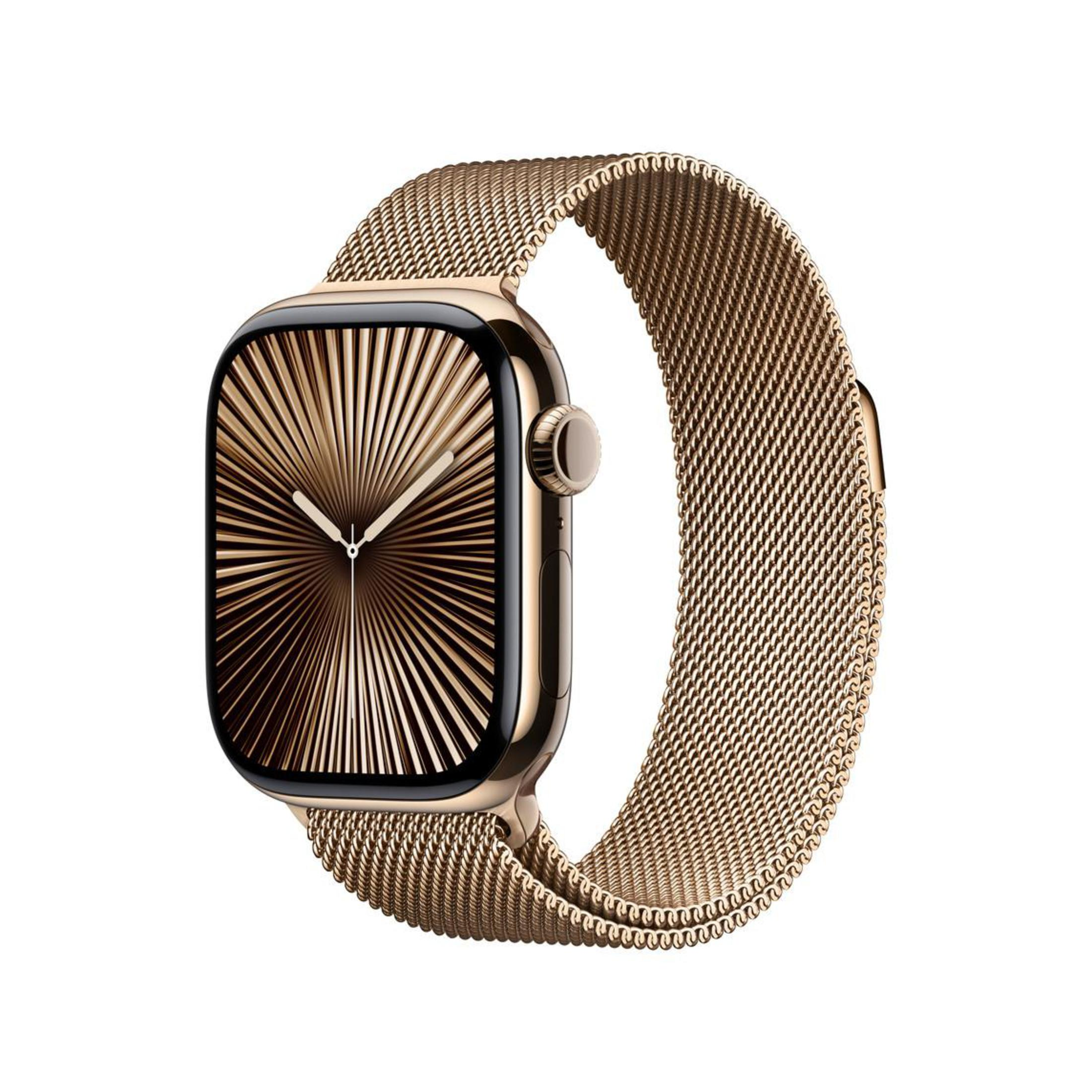 Złoty Apple Watch z siatkowym paskiem. Tarcza ma wzór radialny. Tło jest białe.