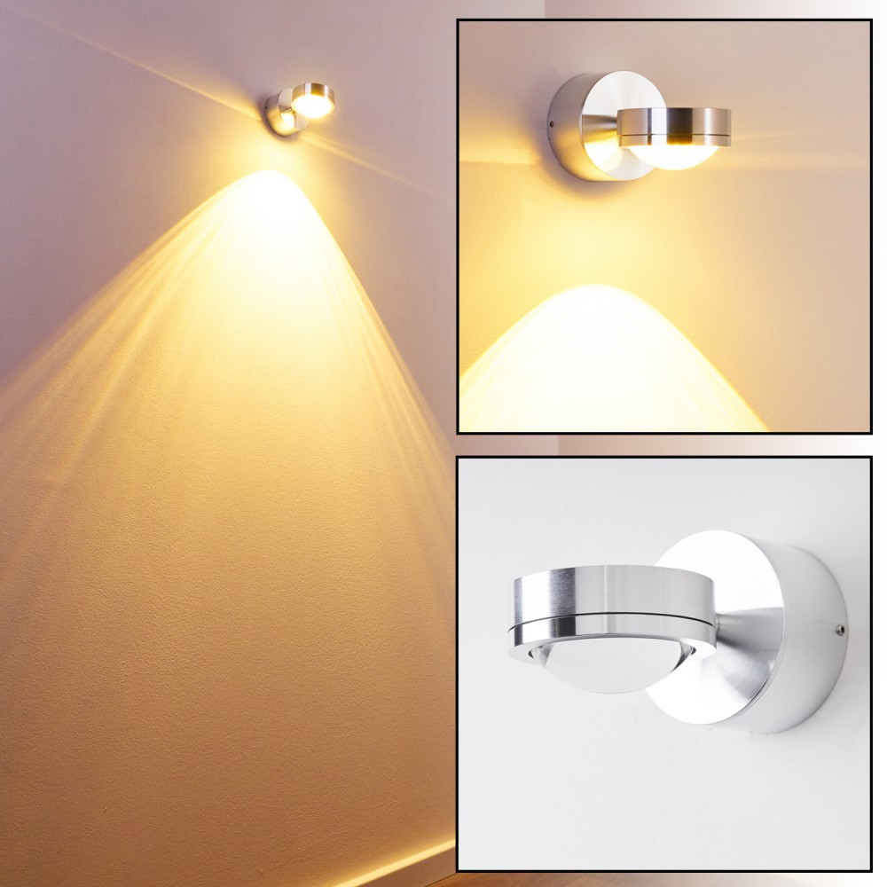 Eine moderne Wandleuchte wird in drei verschiedenen Ansichten gezeigt. Sie hat ein metallisches Finish und strahlt warmes gelbes Licht aus.