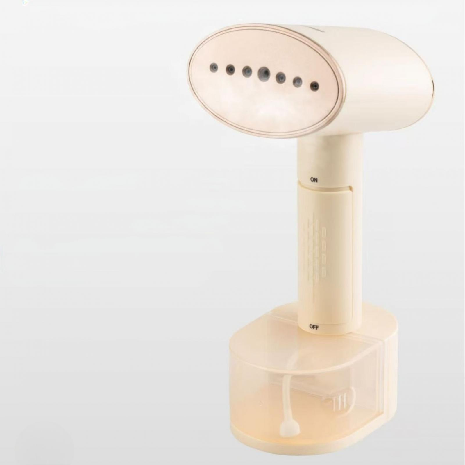 Ein cremefarbener Handdampfer. Der Steamer hat einen Wassertank, einen Ein-/Ausschalter und einen Dampfkopf mit Löchern.