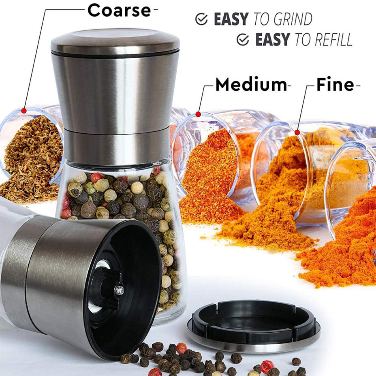 Pfeffermühle mit groben, mittleren und feinen Gewürzoptionen. Gewürze in Glasschalen. Die Mühle ist aus Edelstahl.