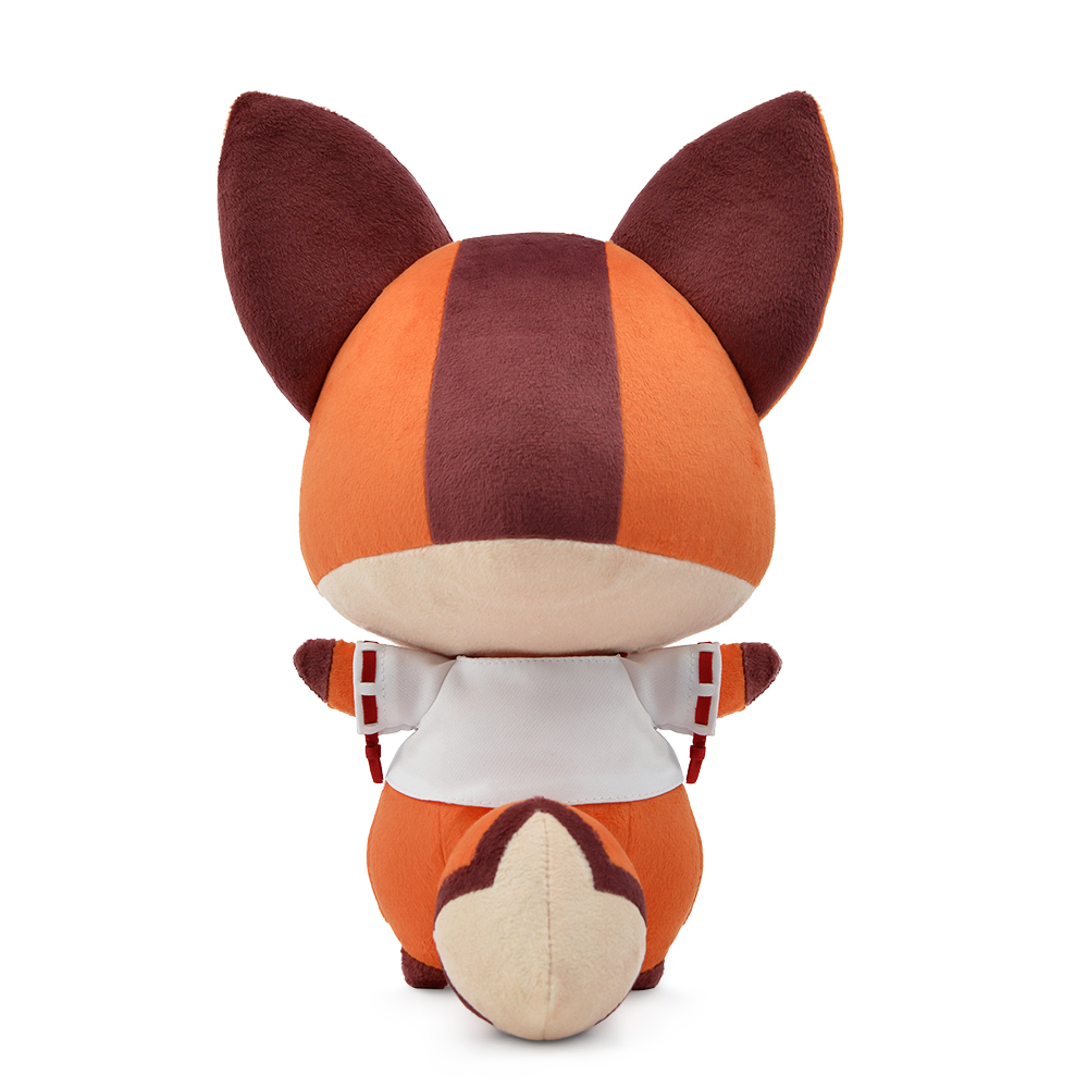 Ein Stofftierfuchs ist von hinten zu sehen. Es hat orangefarbenes Fell mit einem dunkelroten Streifen, braune Ohren und einen cremefarbenen Schwanz.