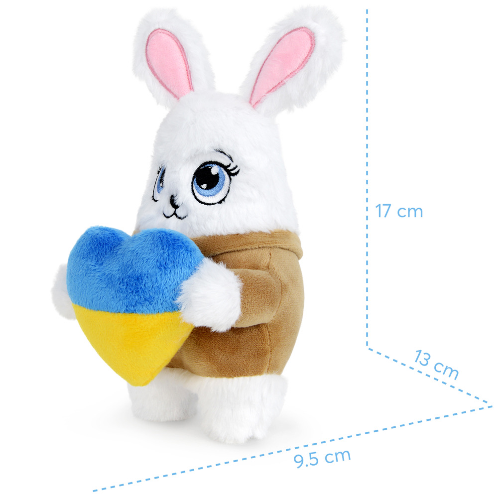 Ein weißes Hasenplüschtier hält ein blau-gelbes Herz. Es trägt eine braune Jacke. Rosa Ohren, blaue Augen und weißes Fell sind sichtbar.