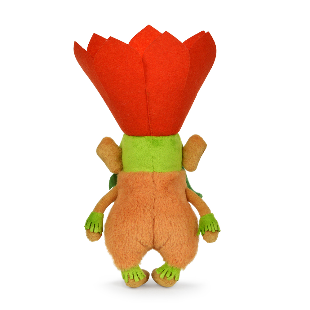 Ein Plüschtier mit orangefarbenem Körper, grünem Hals und einem roten blumenförmigen Kopf, von hinten betrachtet. Es hat kleine Ohren und grüne Hände und Füße.