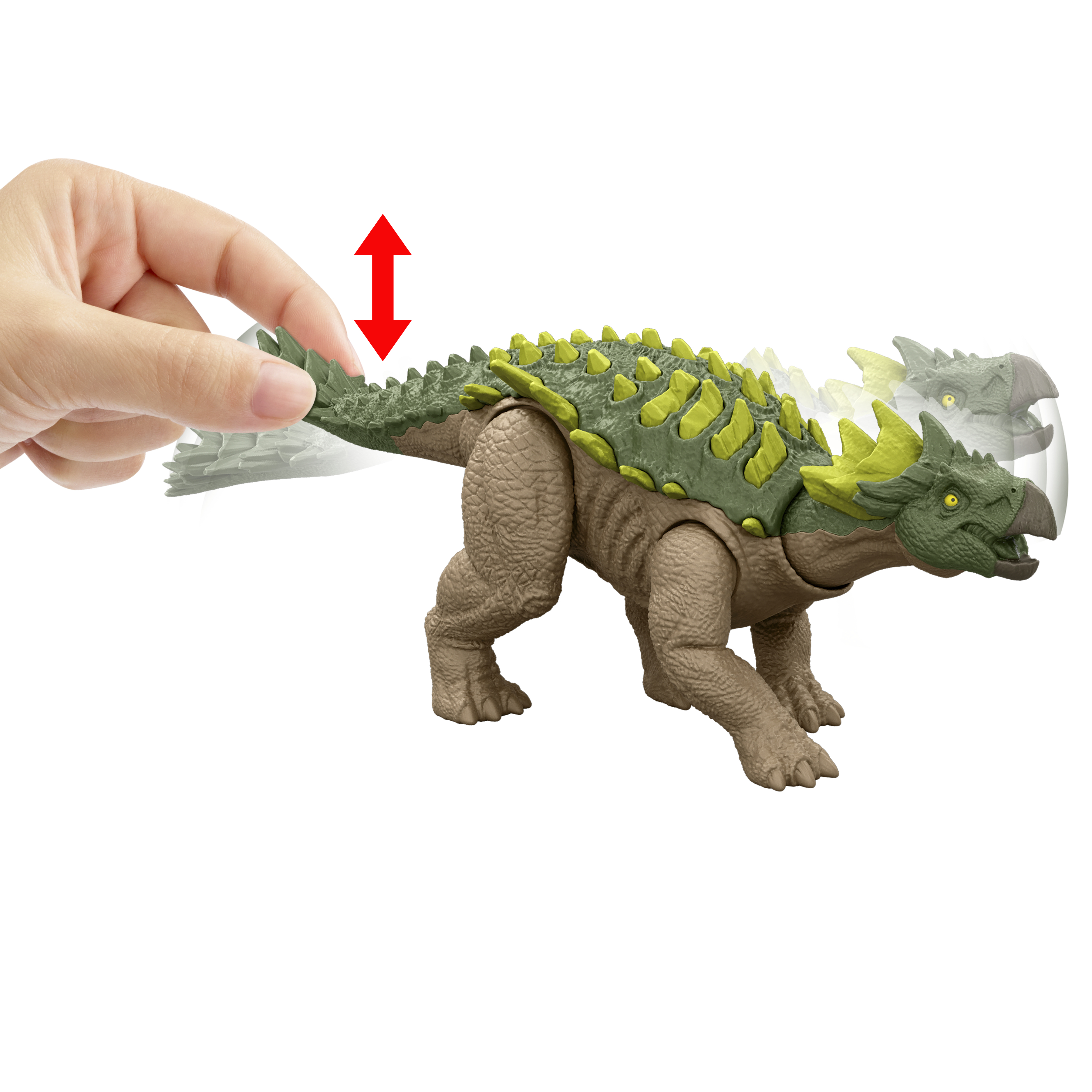 Ein Spielzeug-Dinosaurier wird gezeigt. Eine Hand bewegt seinen Schwanz auf und ab. Der Dinosaurier ist grün und braun mit gelben Stacheln.