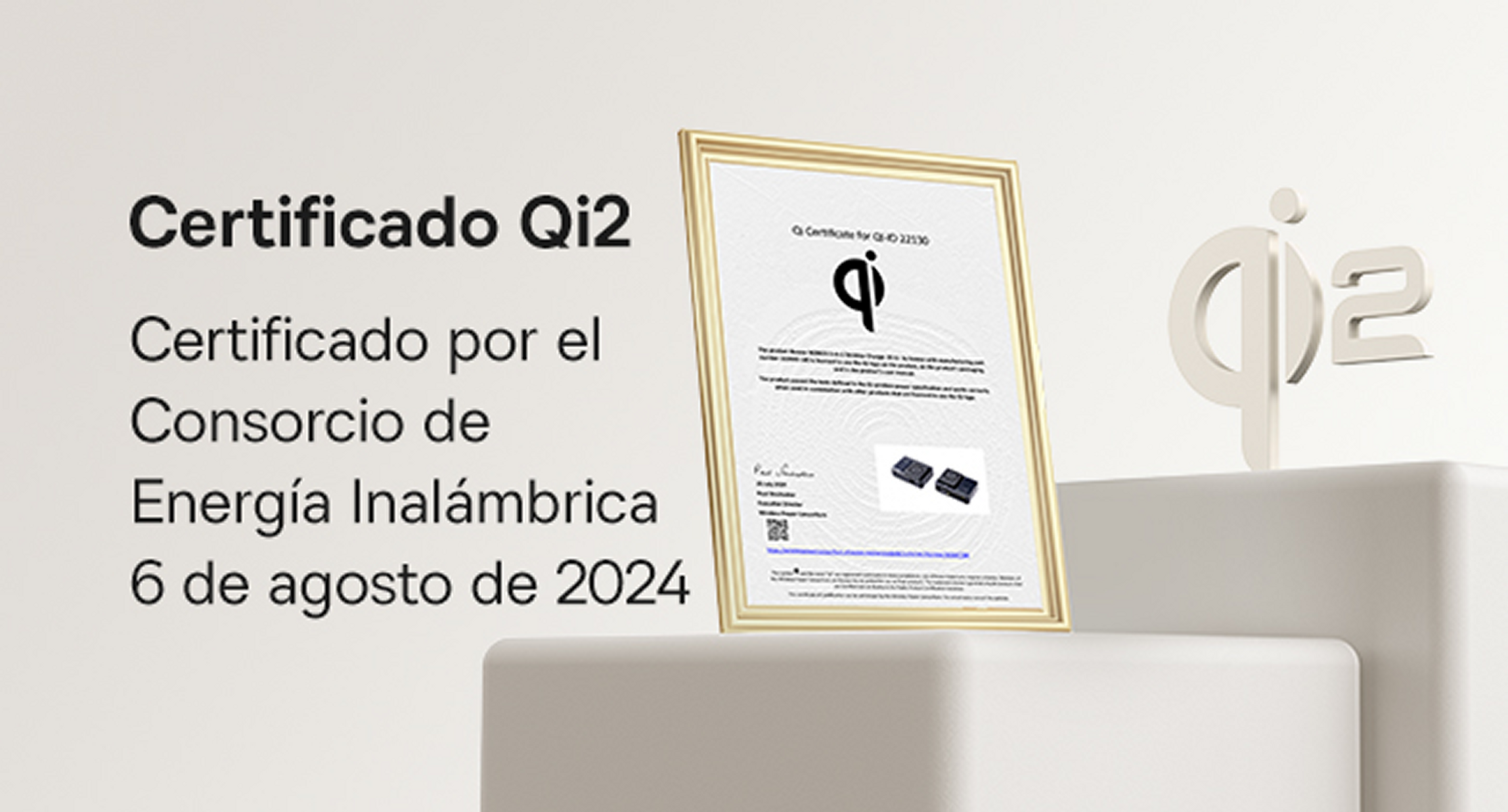La imagen muestra un certificado Qi2 en un marco. Incluye texto en español y el logotipo Qi2. El fondo es blanco con un logotipo Qi2 en 3D.