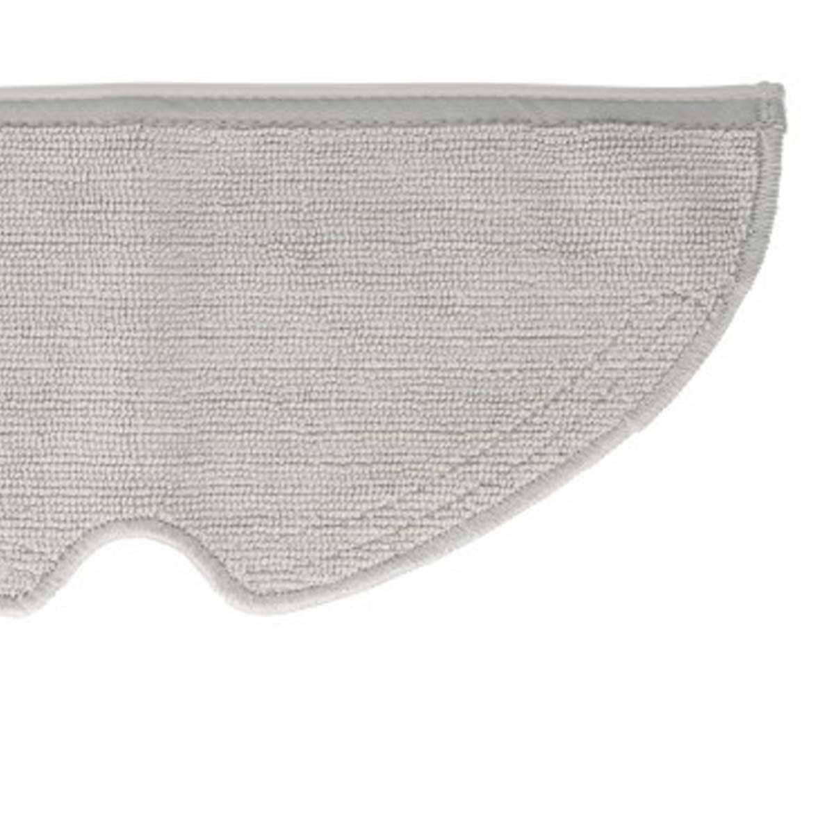 Una almohadilla de limpieza gris, rectangular, con esquinas redondeadas y superficie texturizada, para un robot aspirador.