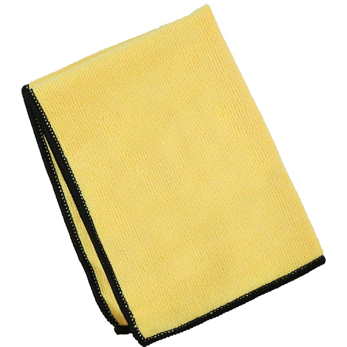 Un paño de microfibra amarillo doblado en rectángulo. Tiene borde negro. Se ve la textura.