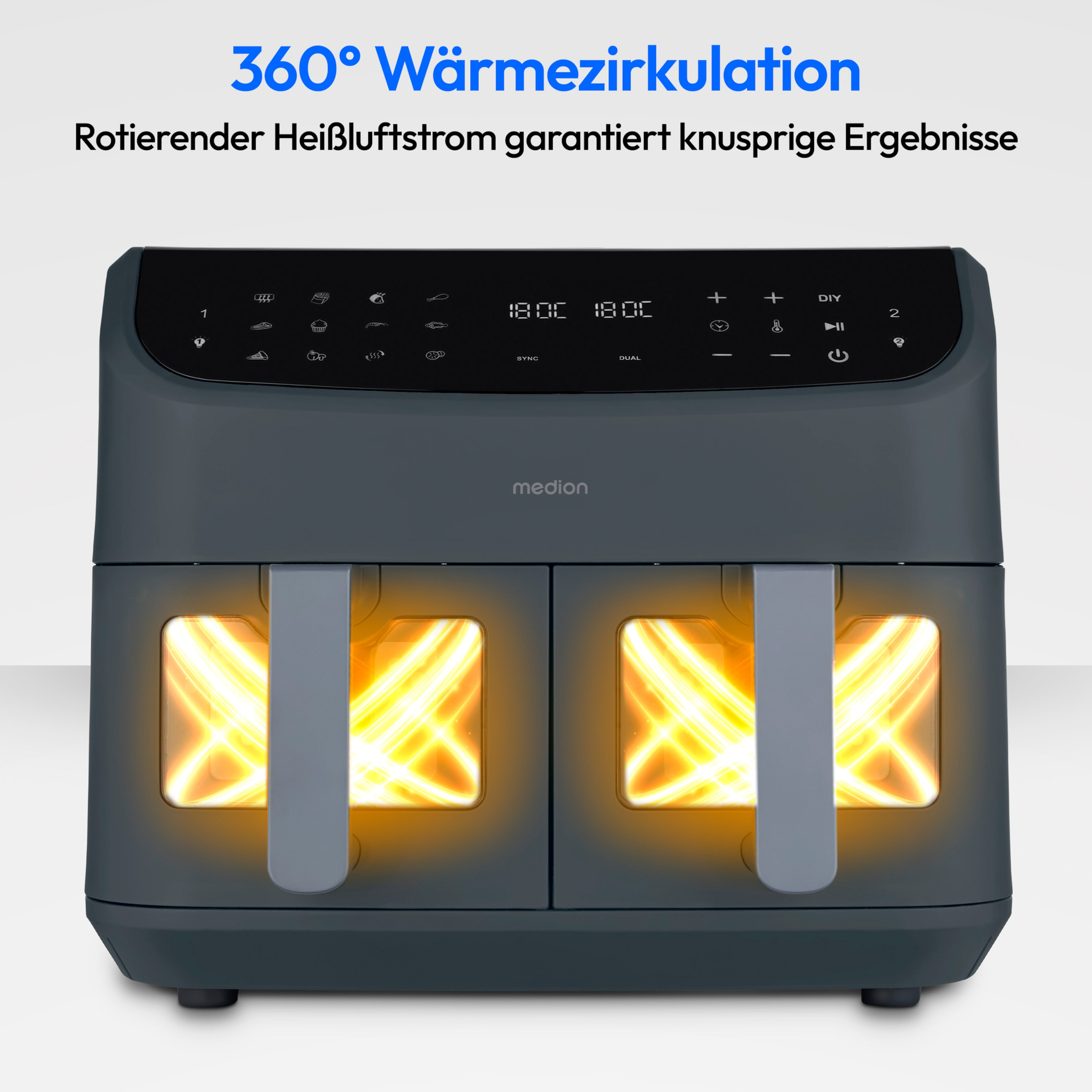 Een donkergrijze airfryer met twee compartimenten, die van binnen oplichten. Bedieningspaneel bovenop, met tekst in het Duits.