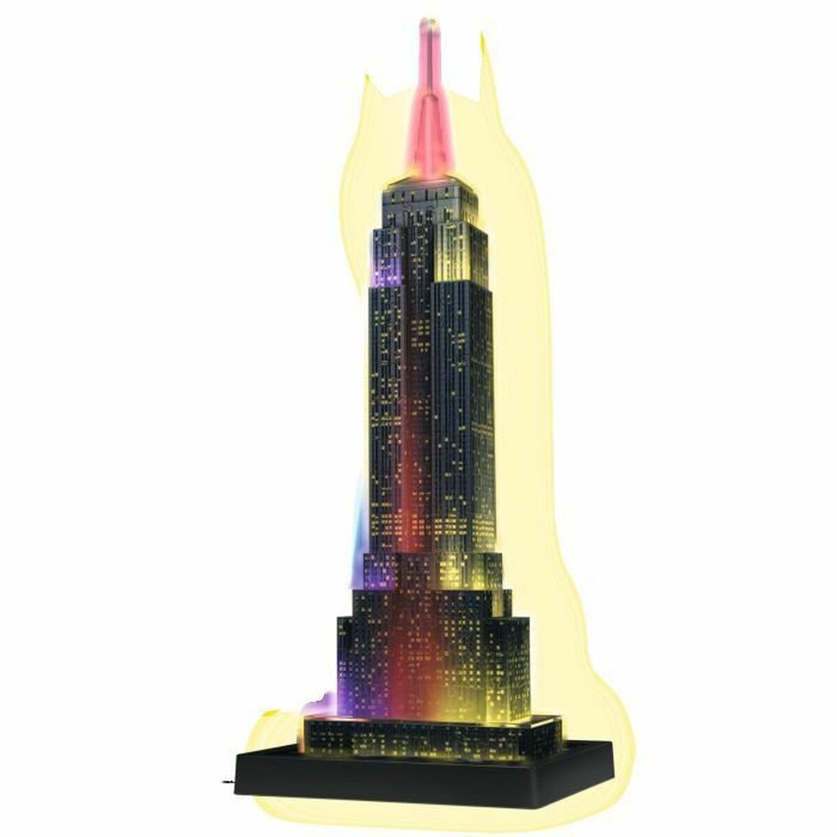 Eine leuchtende Nachbildung des Empire State Buildings. Es hat eine rosa Spitze, beleuchtete Fenster und einen gelben Schein, der es umgibt.