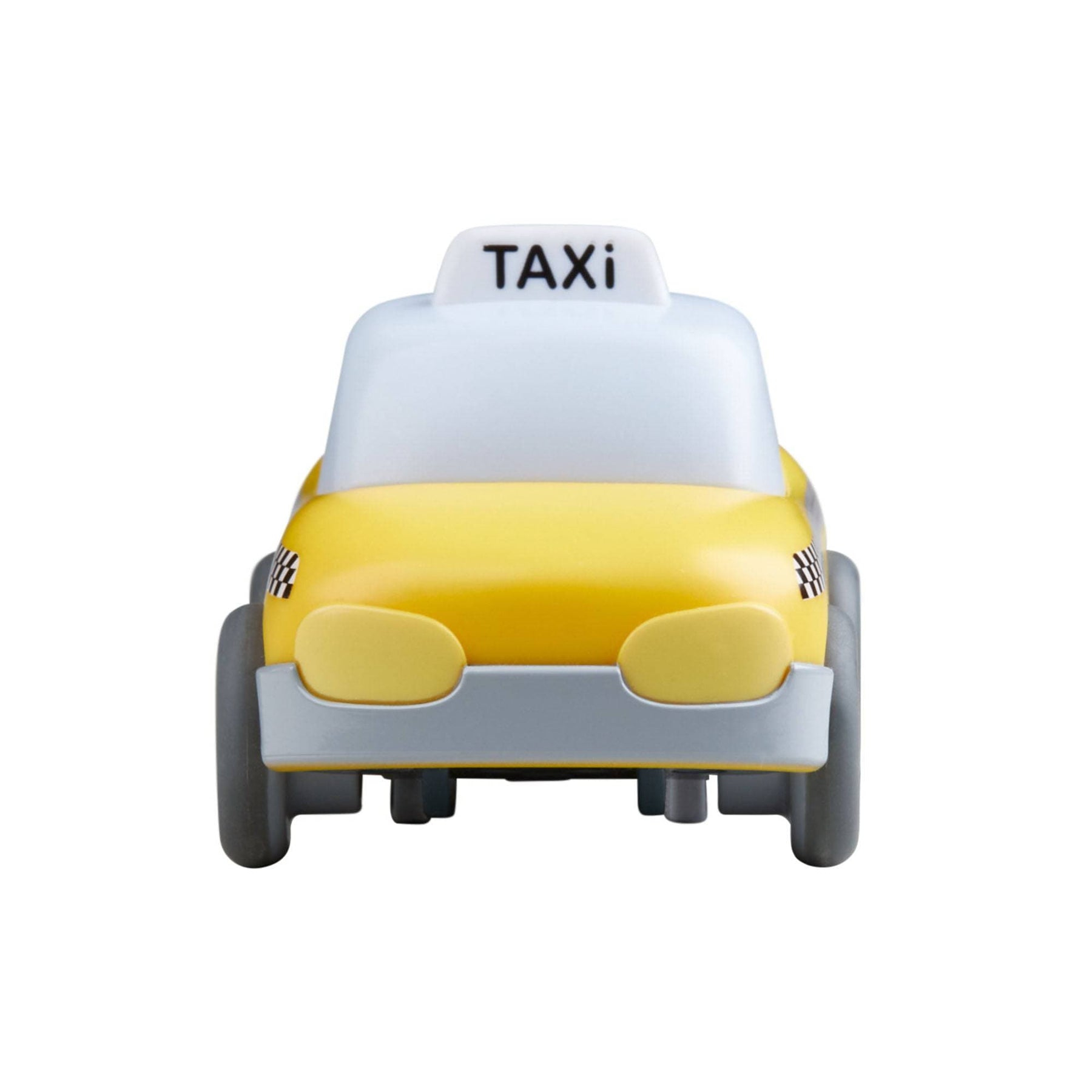 Ein gelbes Spielzeugtaxi mit weißem Dach und 'TAXI' oben. Graue Räder und Stoßstange. Schwarz-weiß karierte Akzente.