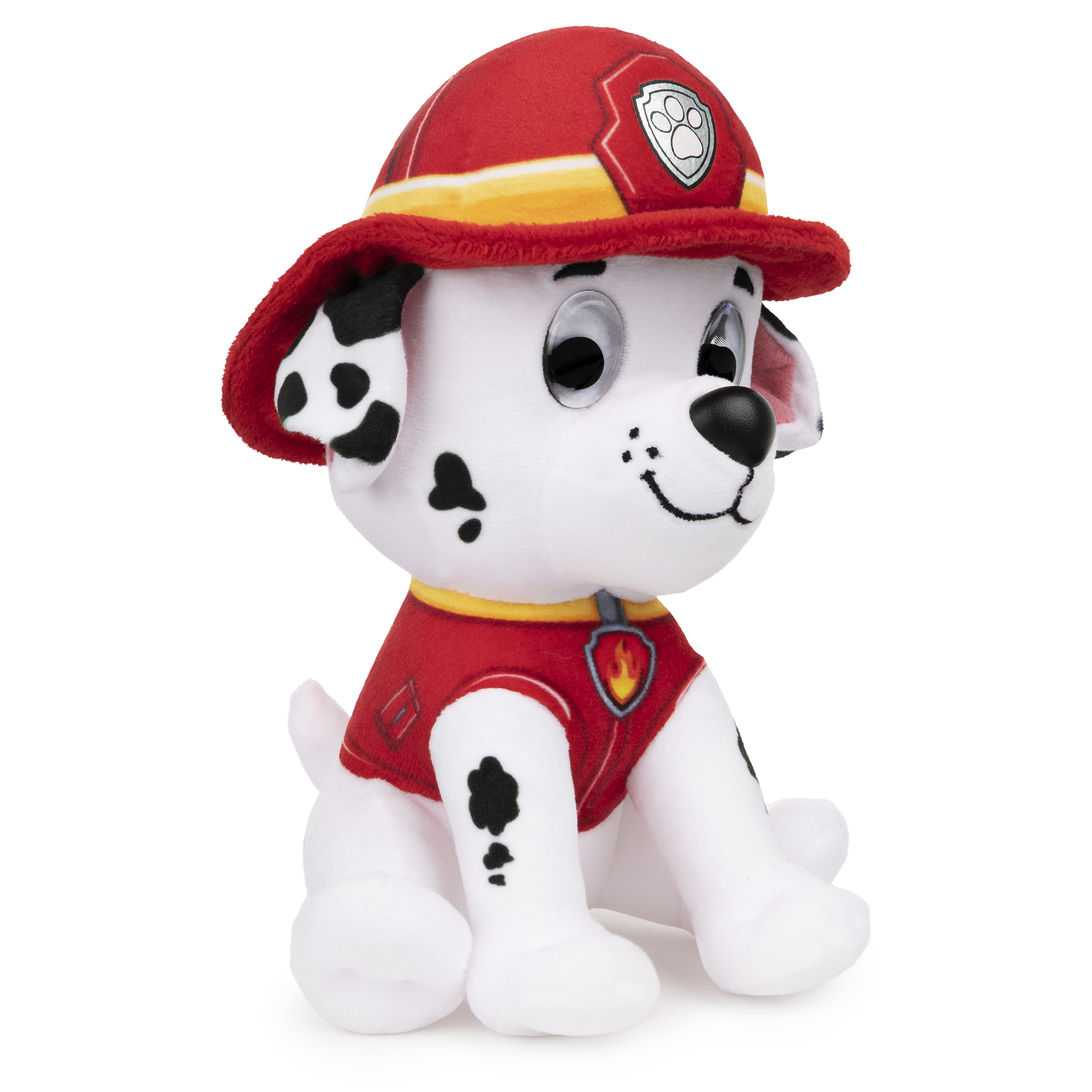 Ein Plüsch-Dalmatiner mit rotem Feuerwehrhut und -weste. Der Hund ist weiß mit schwarzen Flecken.