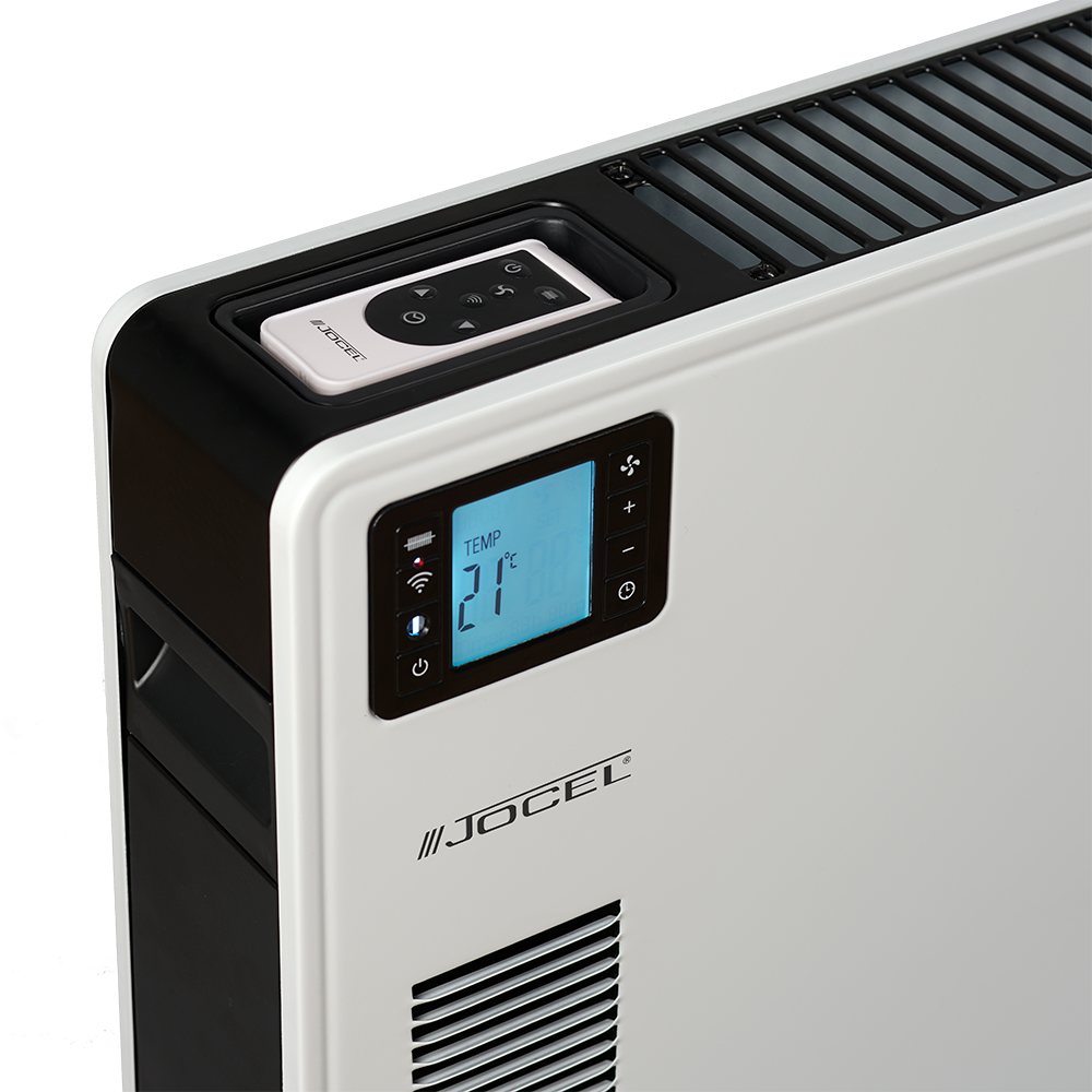 Un calentador JOCEL blanco con una pantalla digital que muestra 21 grados. Un mando a distancia se encuentra encima. Se ven detalles y rejillas negras.