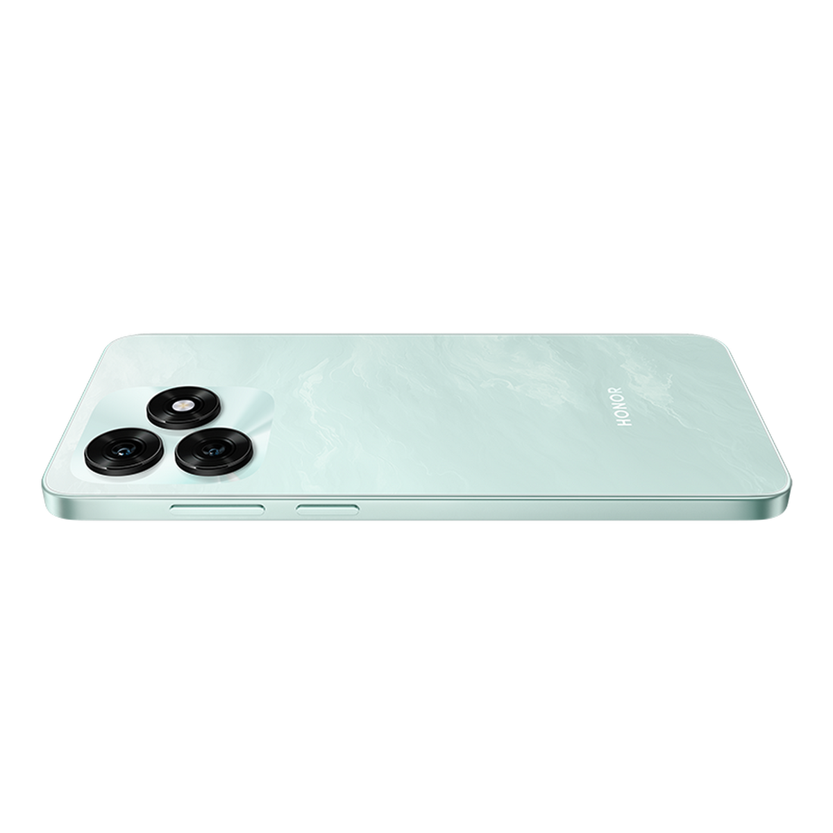 Miętowy zielony smartfon, pod kątem, z potrójnym obiektywem aparatu i logo Honor. Czarne tło.