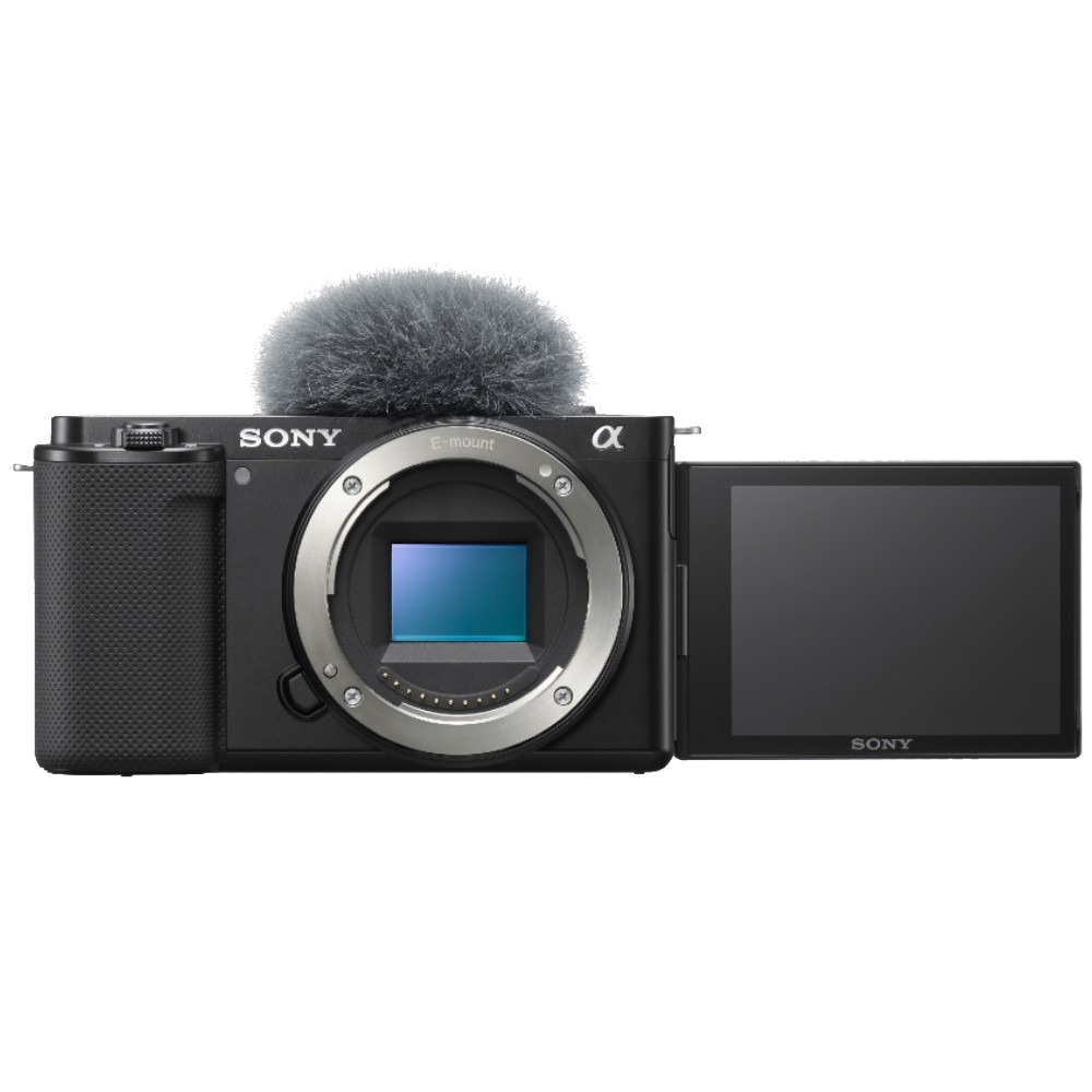 Cámara Sony negra con micrófono. La pantalla está abierta. Tiene una lente con montura E y el logotipo de Sony es visible.