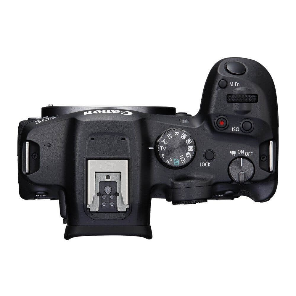 A black Canon EOS camera, top view. Features include mode dial, power button, ISO button, and flash mount.