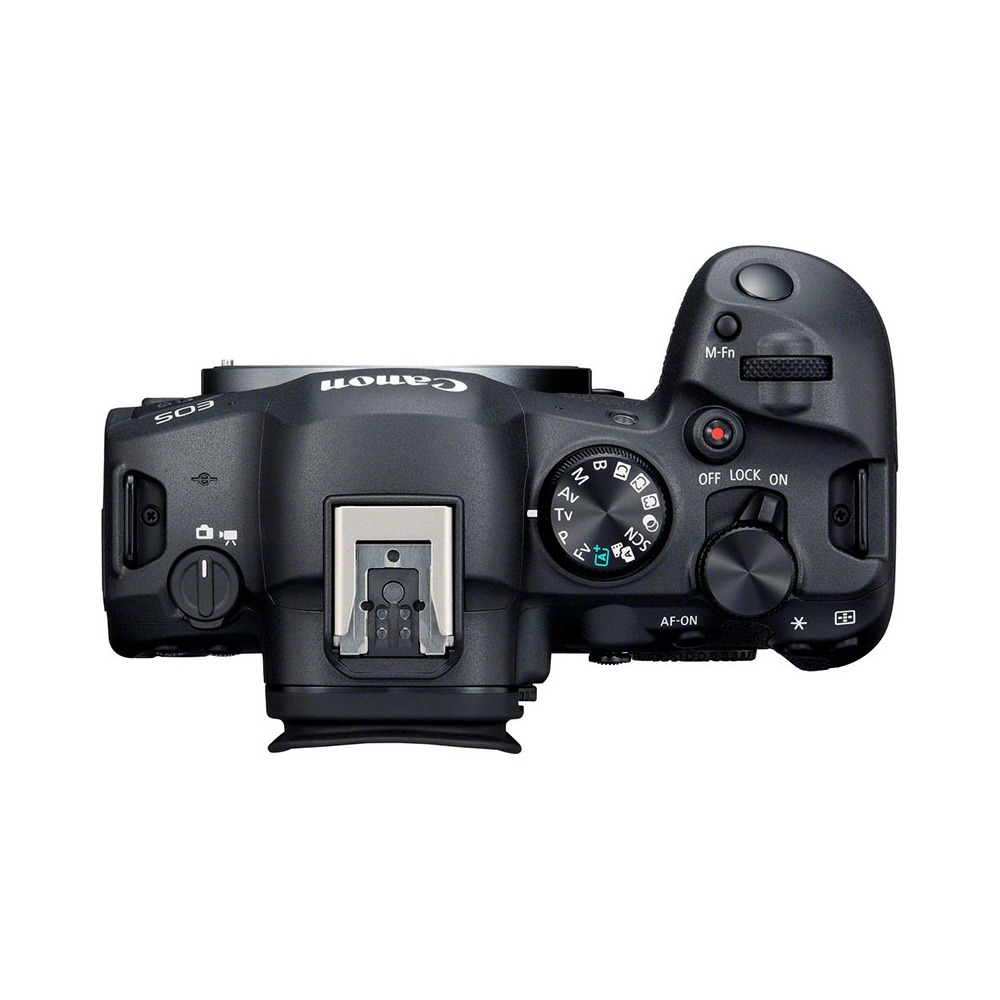 Top view of a black Canon camera. It shows dials, buttons, and the Canon logo on a white background.