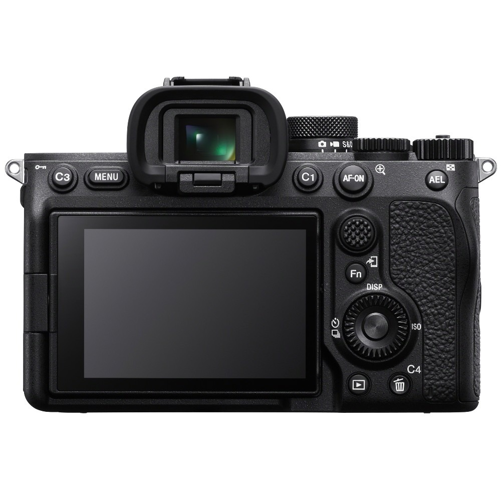 Black digital camera back. Buttons, dials, and a screen are visible. Includes a viewfinder, menu and function buttons.