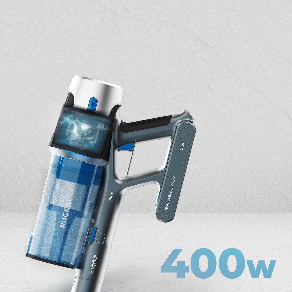 Se muestra una aspiradora inalámbrica gris y azul. Muestra las palabras "ROCKSTAR", "400W" y "REMOVABLE BATTERY".