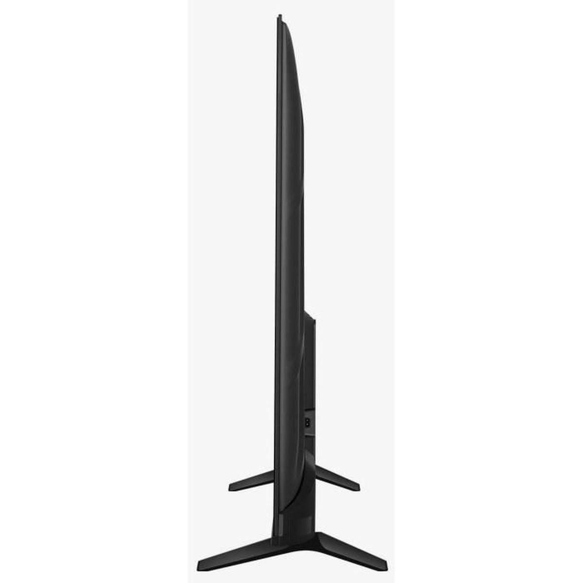 Vista laterale di una TV nera e sottile su sfondo bianco. Il televisore ha due piedi.