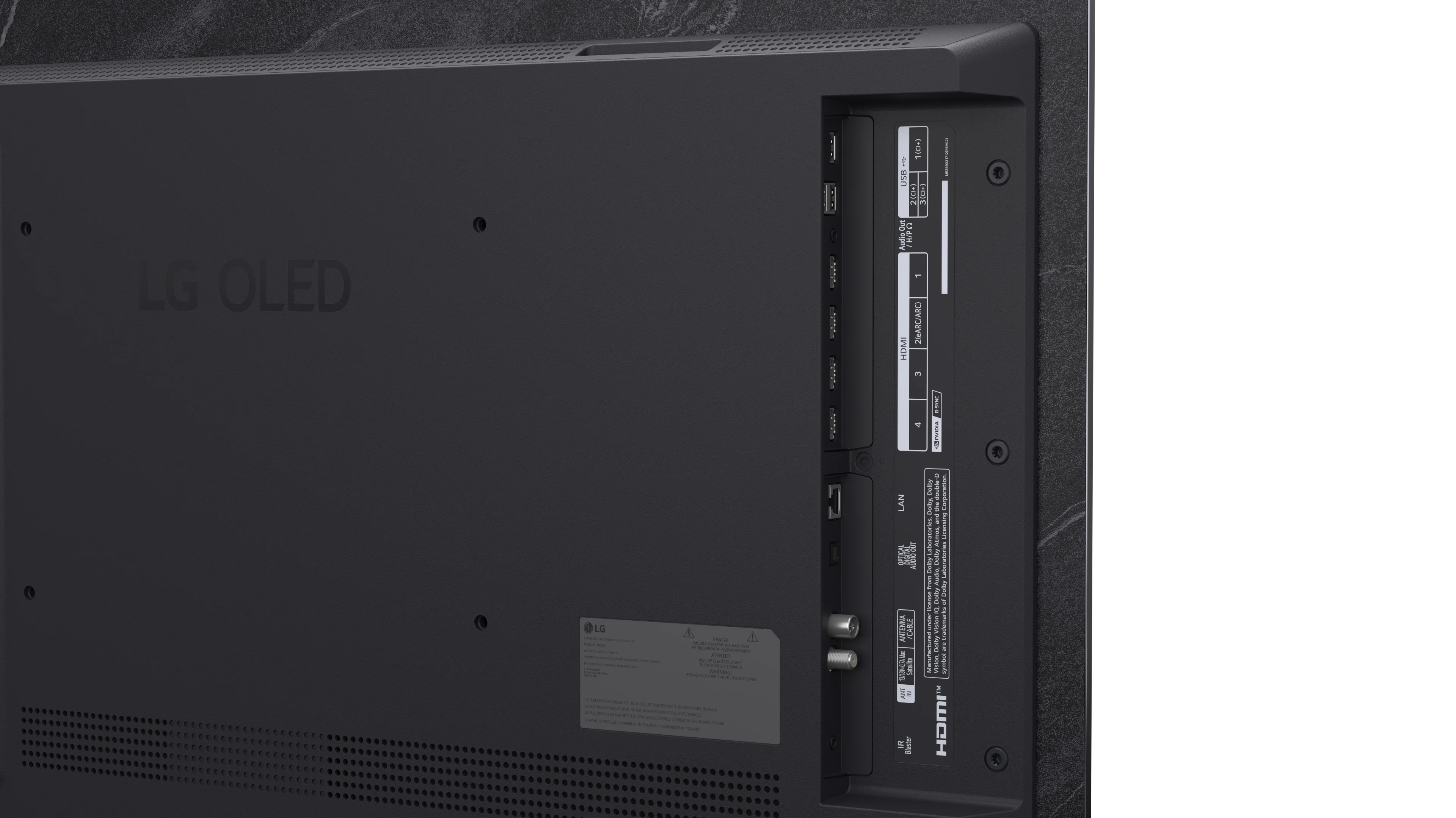 Vista posteriore di un TV LG OLED con porte, etichette e logo LG OLED su superficie scura.