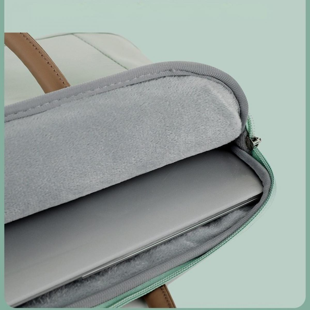 Laptop in einer grauen, gepolsterten Laptoptasche, in einer hellgrünen und weißen Tasche. Brauner Griff oben. Grüner Hintergrund.