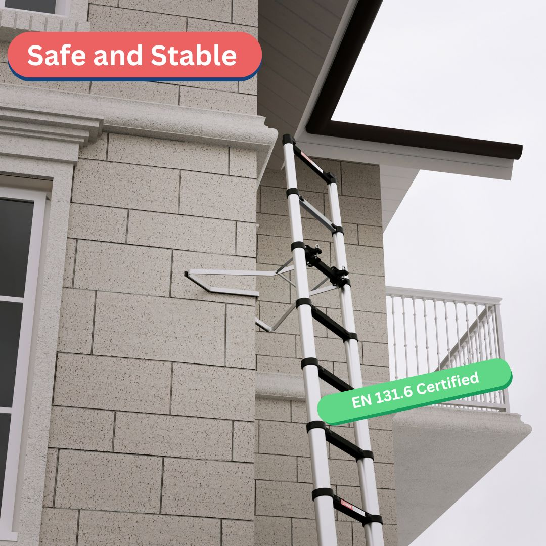 A retractable ladder is mounted on a brick wall. A balcony is visible on the right. Text reads 'Safe and Stable' and 'EN 131.6 Certified'.