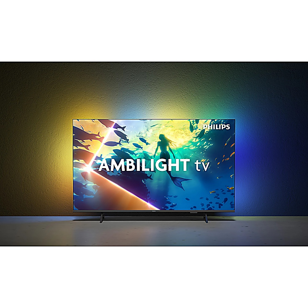 Un televisore Philips Ambilight mostra una scena di sirena. Il televisore ha una cornice scura, con il logo Philips. Lo sfondo presenta sfumature di colore.