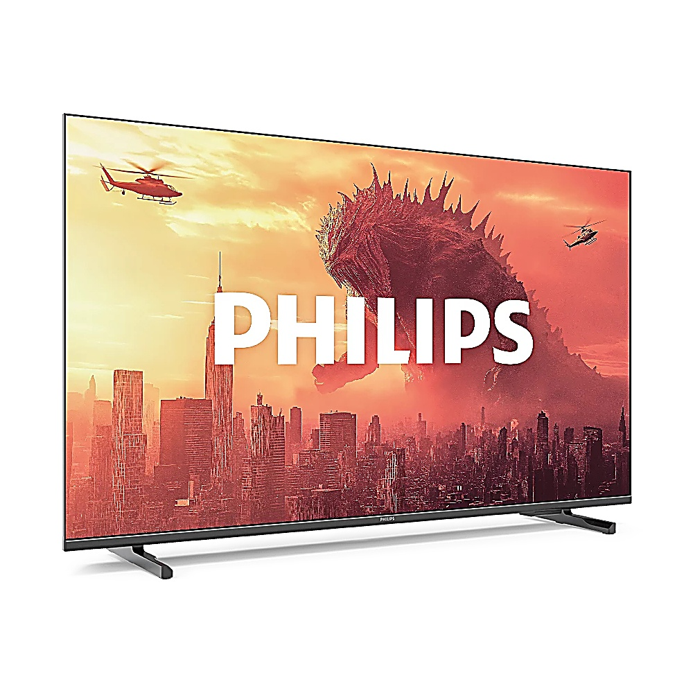 Telewizor Philips wyświetla miejski krajobraz z Godzillą, helikopterami i logo Philips.