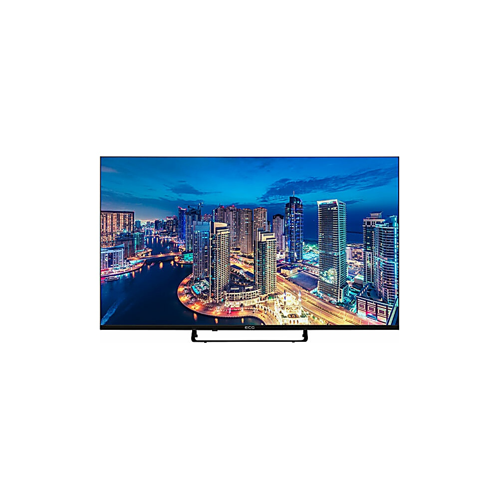 Telewizor wyświetla nocny krajobraz miejski. Widoczne są drapacze chmur, oświetlone budynki i zbiornik wodny pod ciemnoniebieskim niebem.