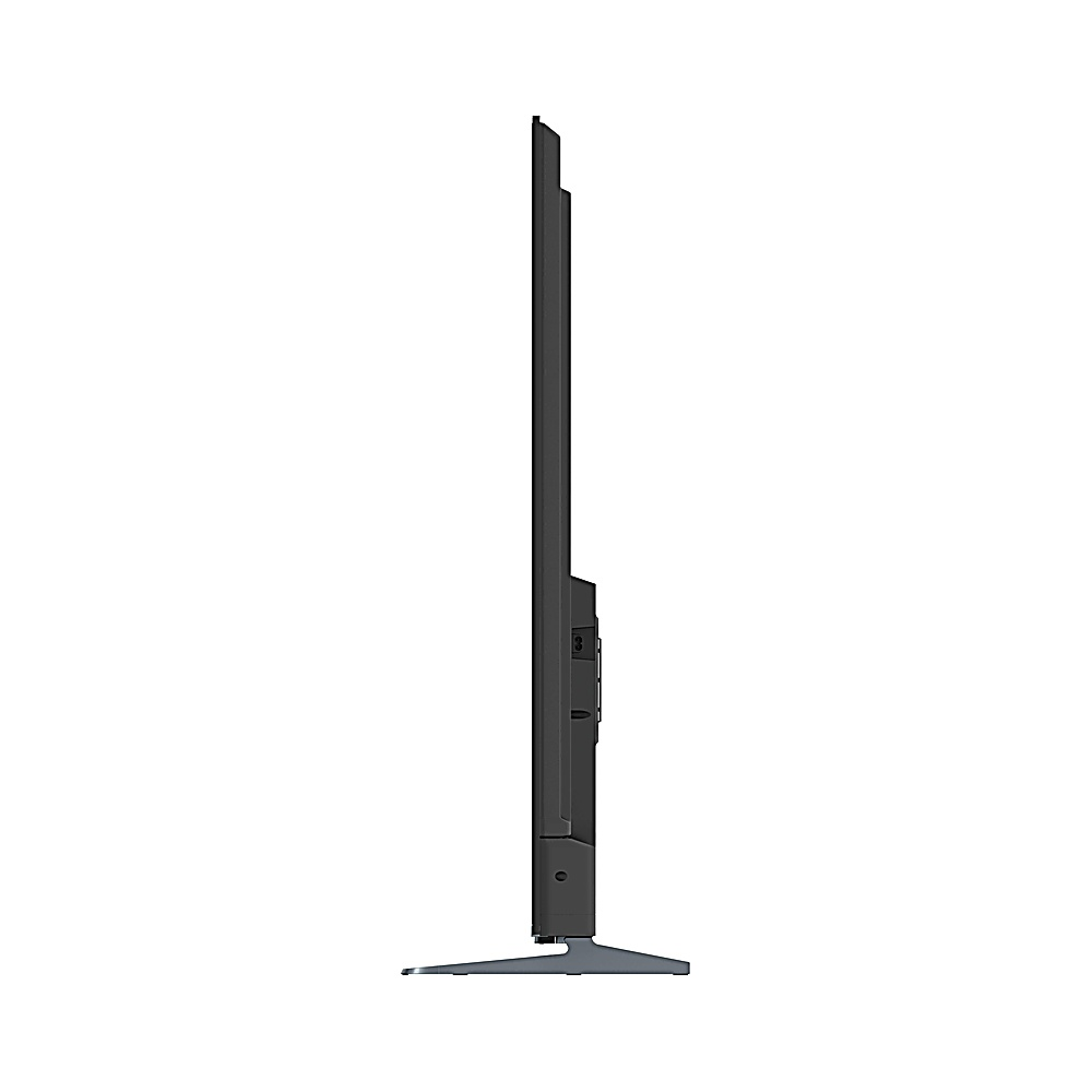 Vista lateral de un televisor negro y delgado con soporte. La pantalla mira a la izquierda. El soporte es gris y el fondo es blanco.