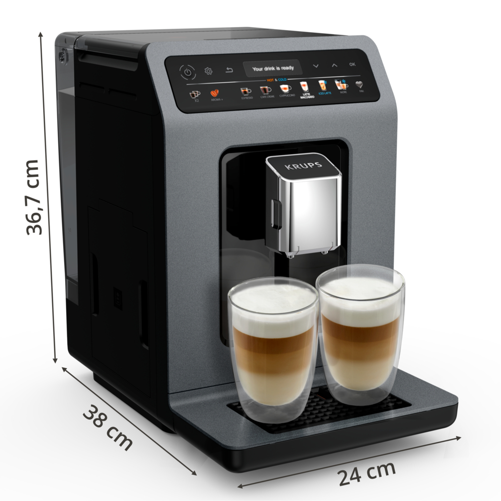 Una macchina da caffè Krups con due latte macchiato. La macchina è grigia e nera. Le dimensioni sono indicate.
