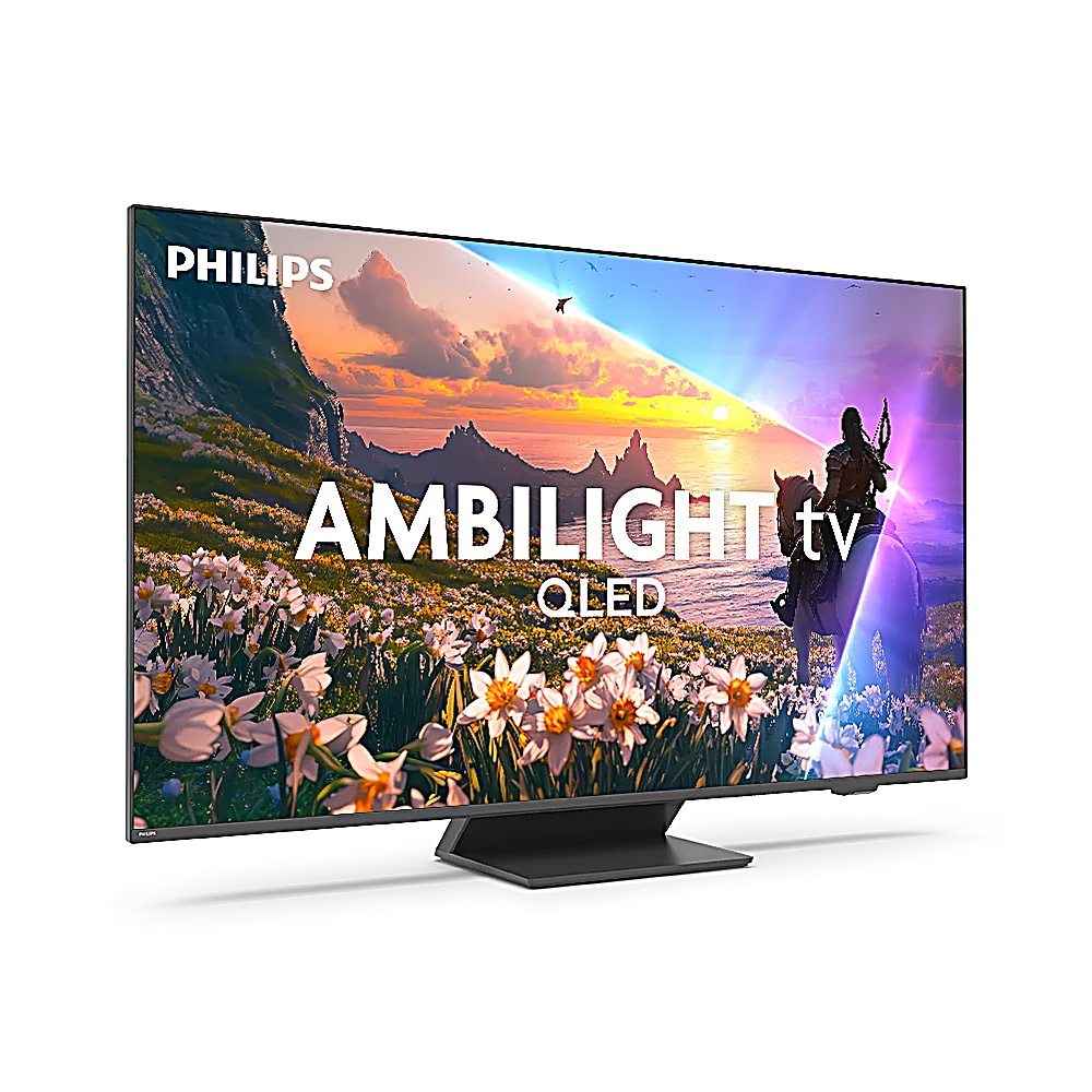 Telewizor Philips Ambilight OLED wyświetla malowniczy krajobraz z jeźdźcem na koniu. Na pierwszym planie widać kwiaty. Telewizor stoi na czarnym stojaku.