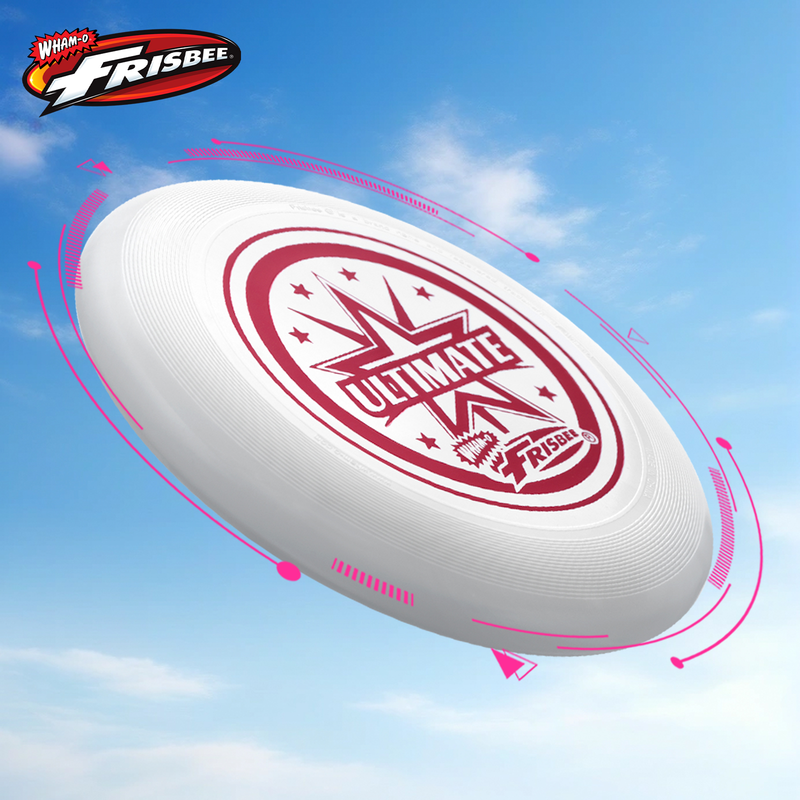 Weiße Frisbee mit rotem 'ULTIMATE'-Text und Logo, fliegt in blauem Himmel. Wham-O Marke sichtbar.