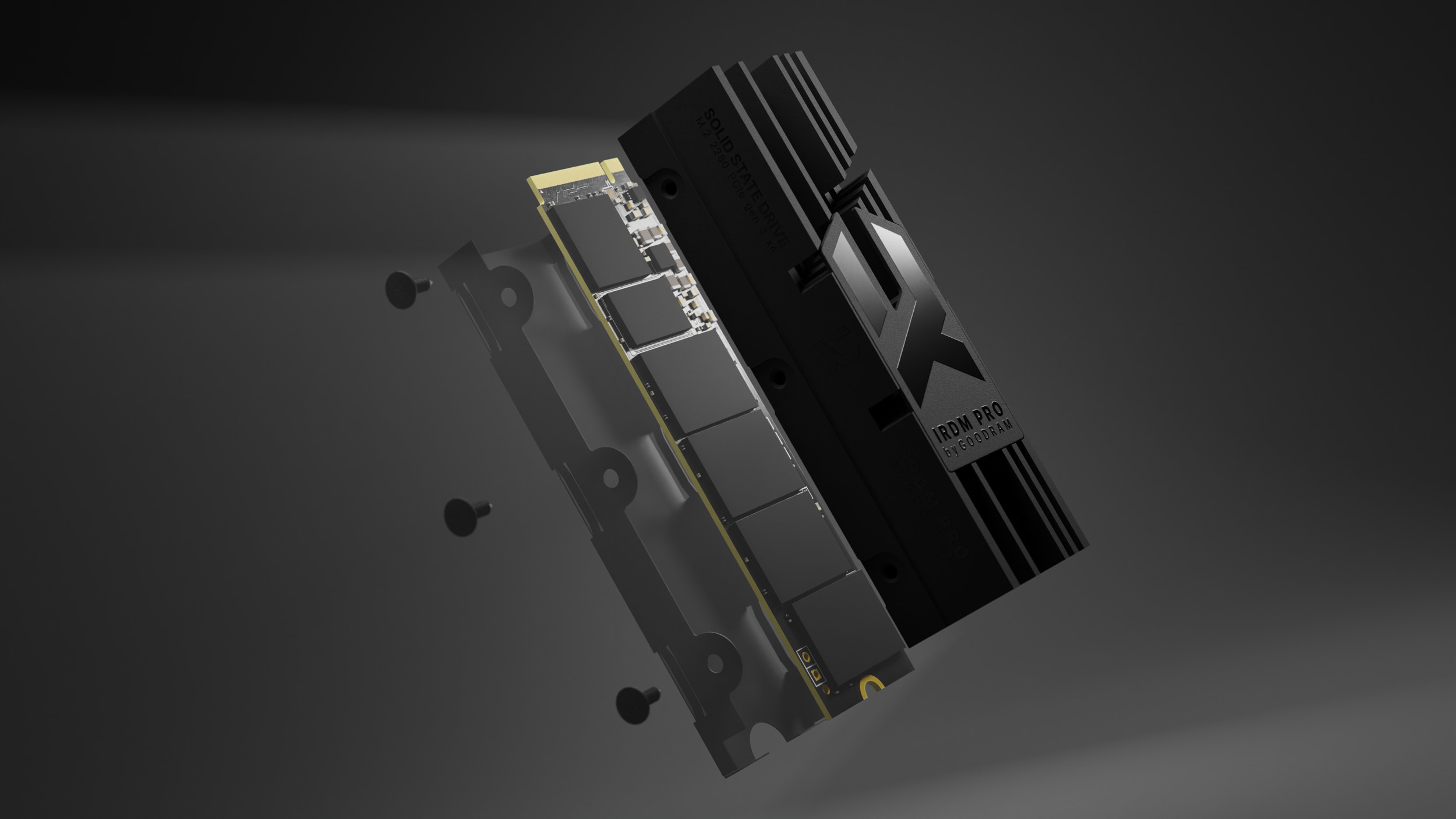 An exploded view of a black SSD. The components are separated, with the main body labeled IRDM PRO. Screws are also visible.