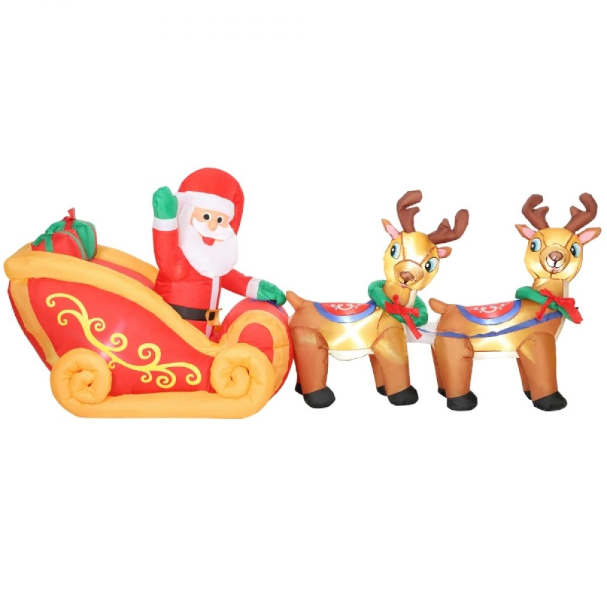 Aufblasbarer Weihnachtsmann in einem Schlitten, der von zwei Rentieren gezogen wird. Der Weihnachtsmann winkt mit grünem Handschuh. Der Schlitten hat ein Geschenk.