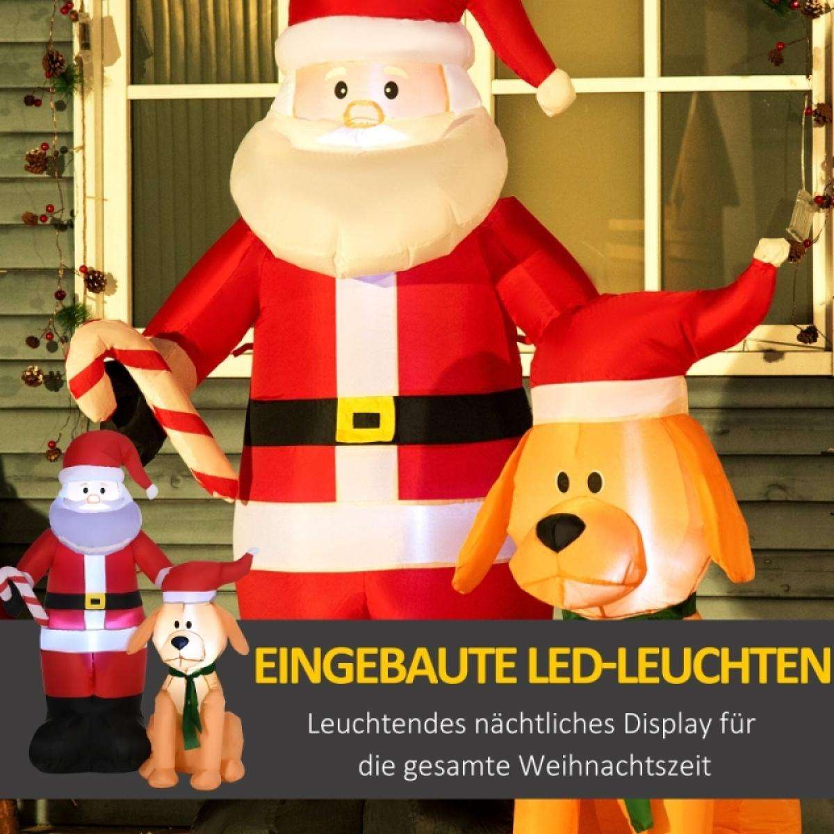 Aufblasbare Santa Claus und Hund Dekorationen. Santa hält eine Zuckerstange. Der Hund trägt einen grünen Schal. Text: Eingebaute LED-Leuchten.