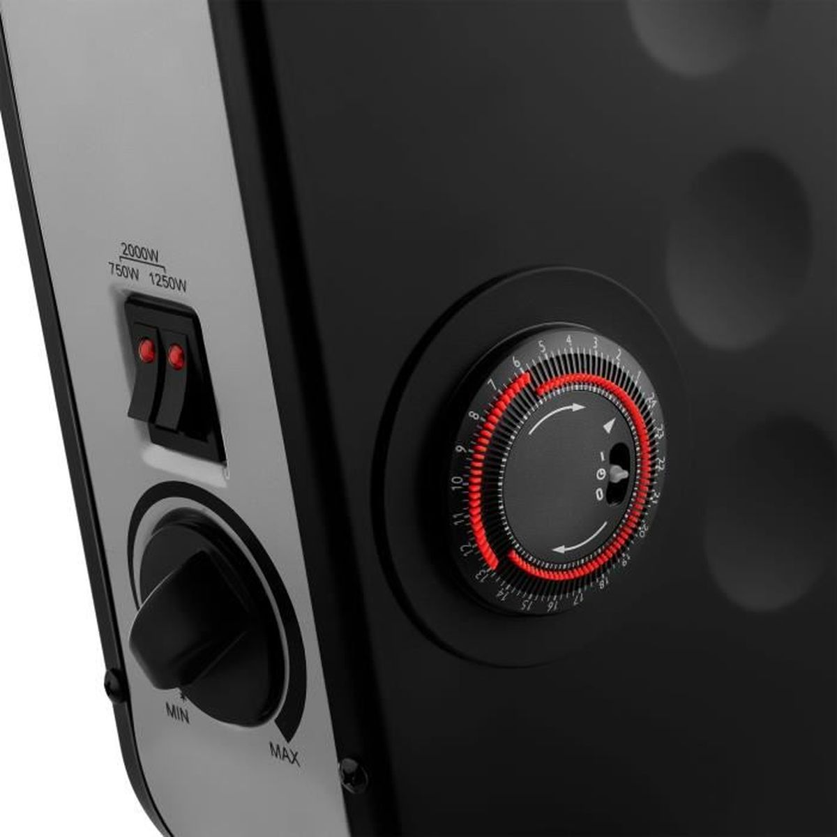 Primer plano de un electrodoméstico negro y gris con interruptores, un dial con marcas rojas y una perilla rotulada 'MIN' y 'MAX'.