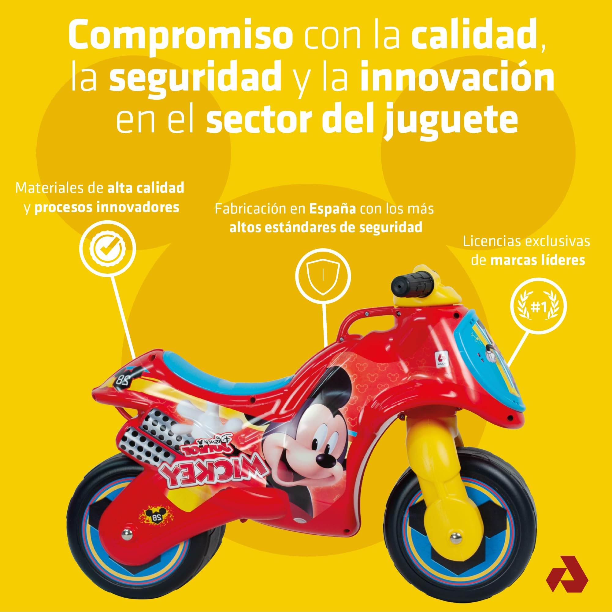 Motocicleta de juguete roja y amarilla con gráficos de Mickey Mouse sobre fondo amarillo. Texto: Calidad, seguridad, innovación.