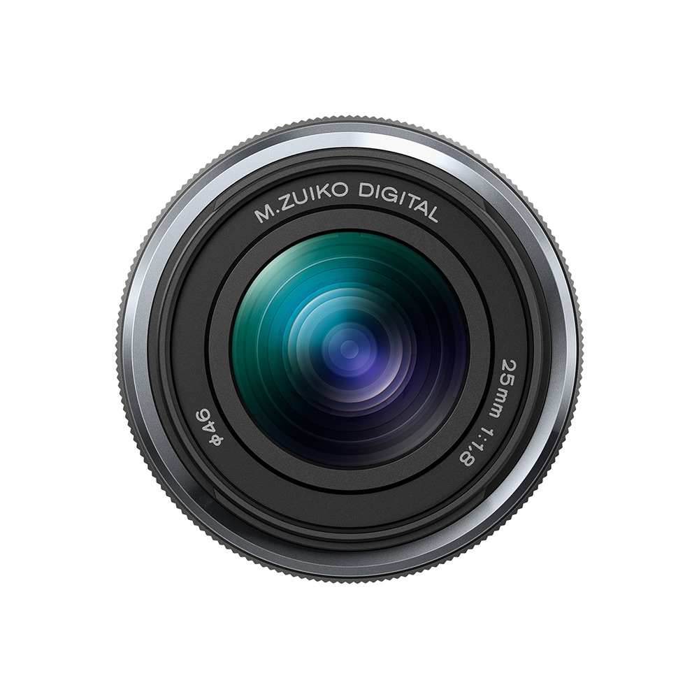 A close-up shot of a camera lens. It has a black body, silver rings, and a glass front reflecting blue and green.