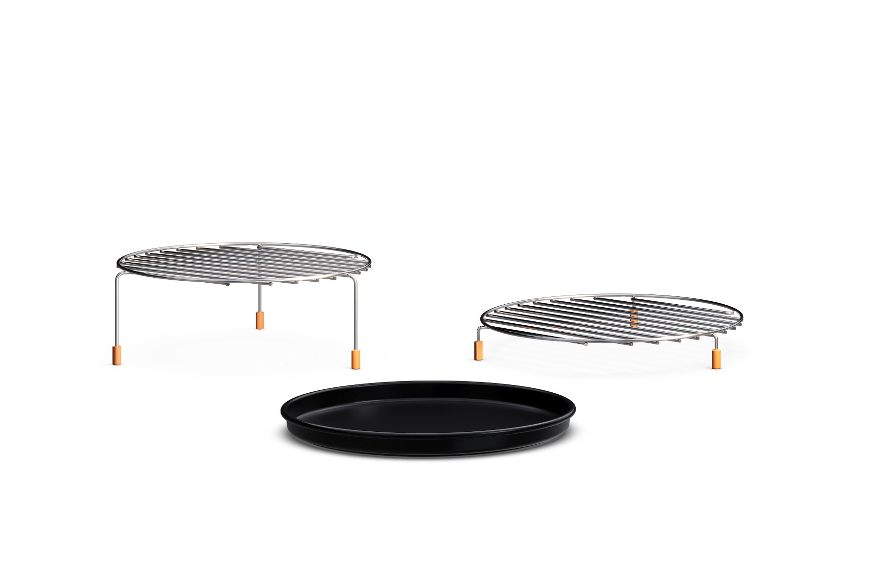 Three metal cooking racks and a black tray are on a white surface. Two racks have legs, one is on the right. The tray is in the center.