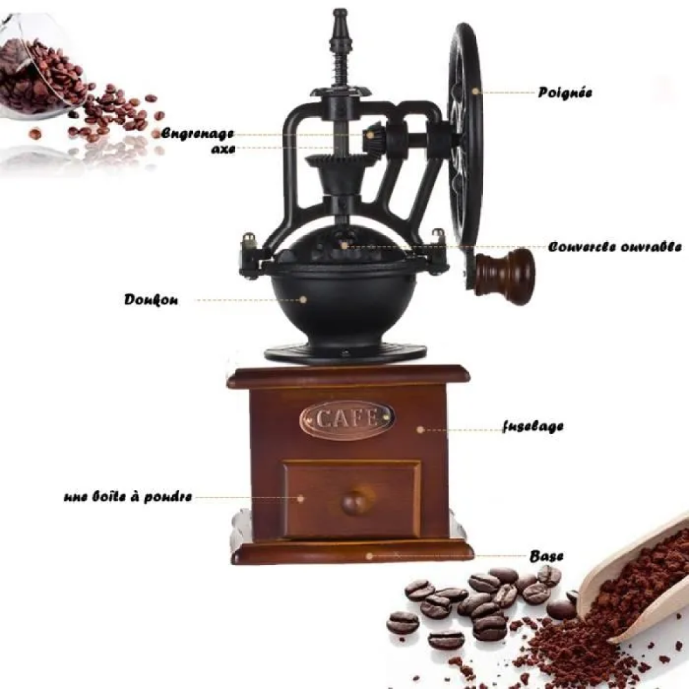 Eine manuelle Kaffeemühle mit Holzsockel, schwarzem Mahlwerk und Handkurbel. Kaffeebohnen sind verstreut.