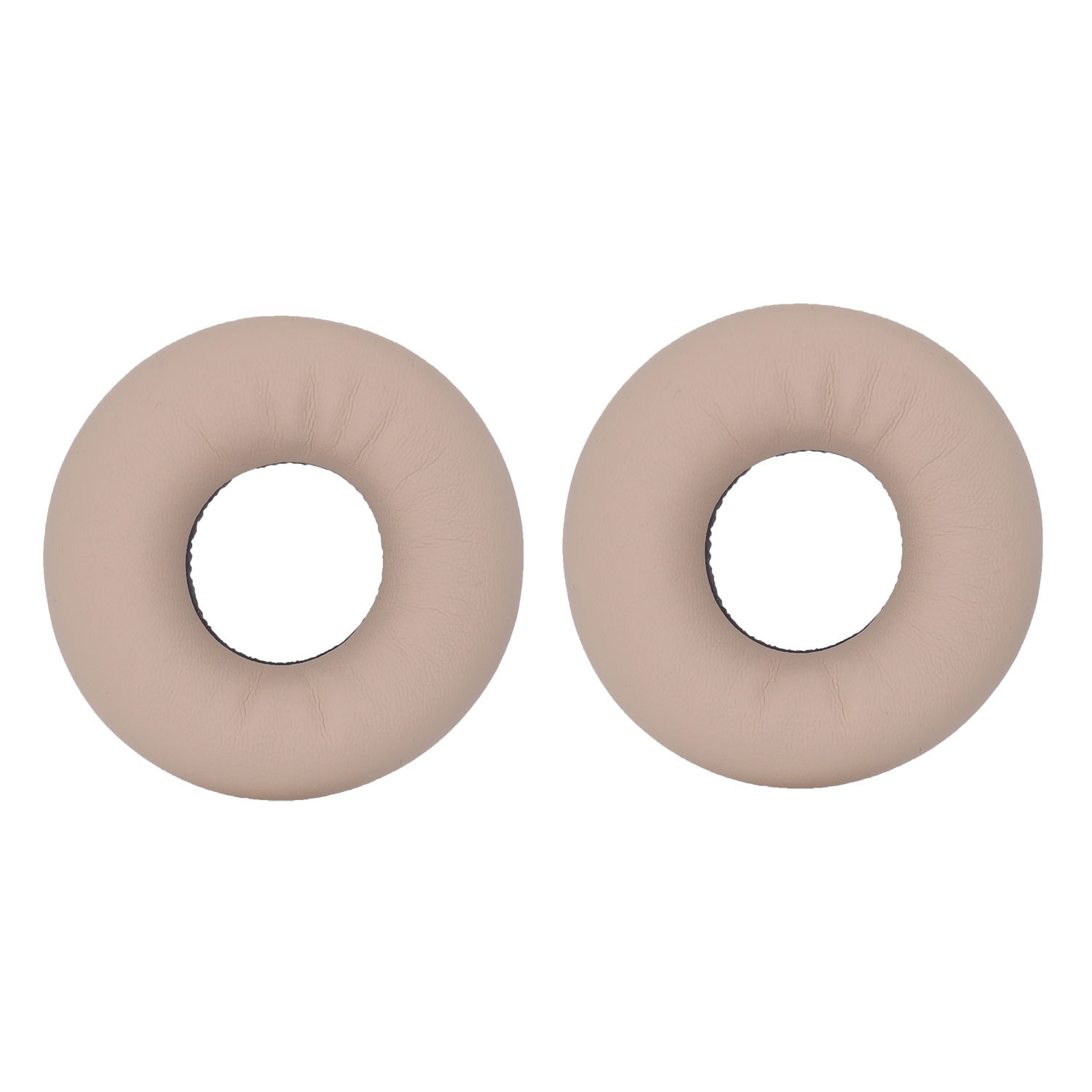 Zwei beige, kreisförmige Ohrpolster mit dunklen Innenkreisen auf weißem Hintergrund. Sie scheinen aus Leder oder ähnlichem Material zu sein.