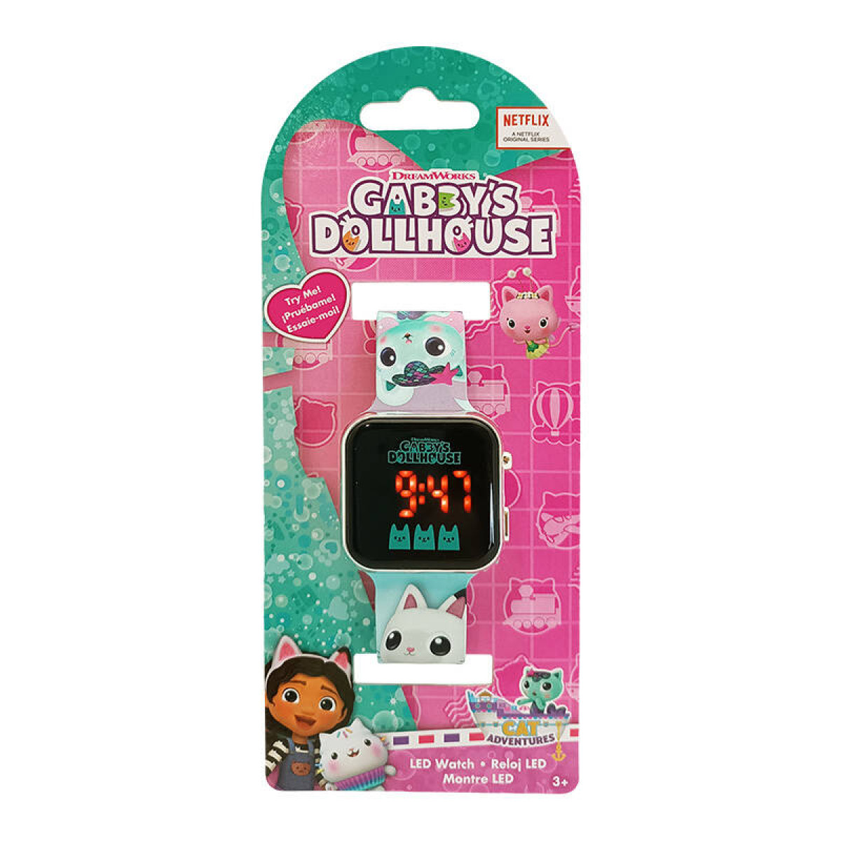Un orologio LED di Gabby's Dollhouse. Il quadrante mostra le 9:47. La confezione è rosa e turchese, con Gabby e un personaggio di gatto.